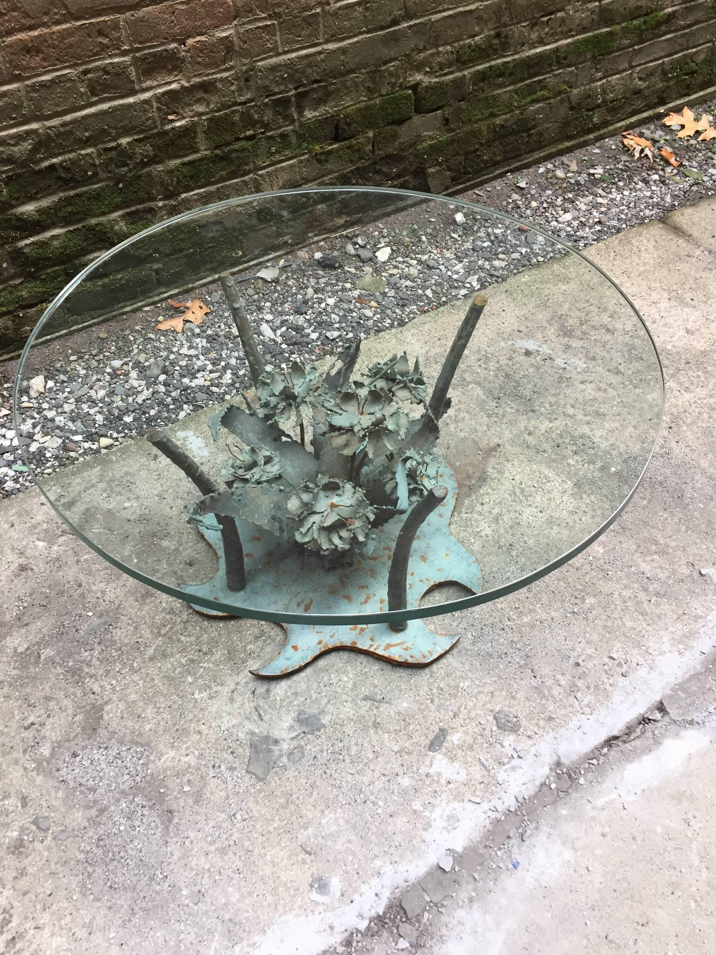 Designed by Silas Seandel. Glass top coffee table with copper and steel floral motif base. Amazing verdi gris patina. 