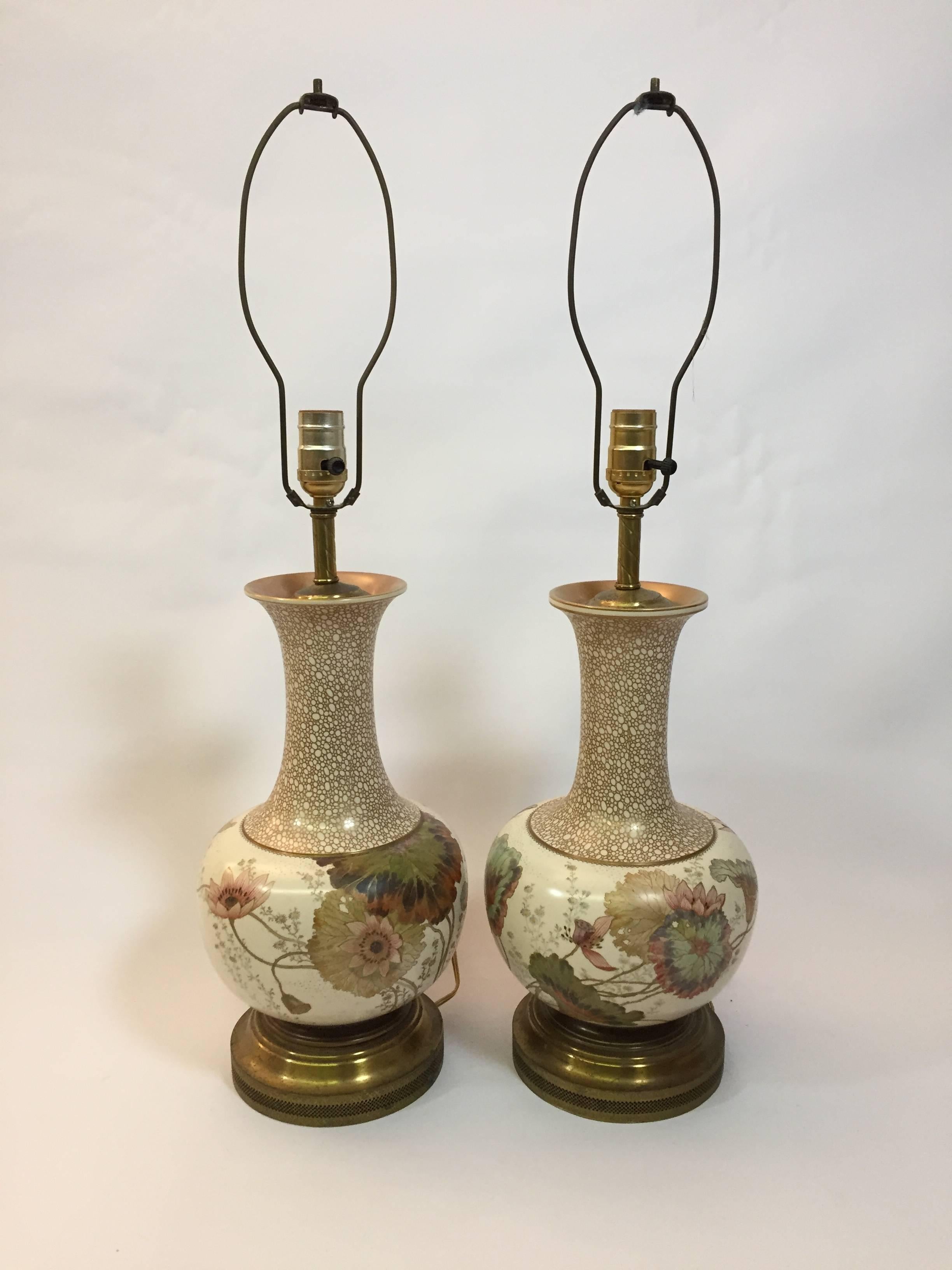 Amazing pair of hand decorated Art Nouveau Royal Doulton Burslem porcelain lamps. Fully signed on the underside and professionally drilled and mounted lamps. After extensive research, the hand-painted monogram is yet to be attributed to one