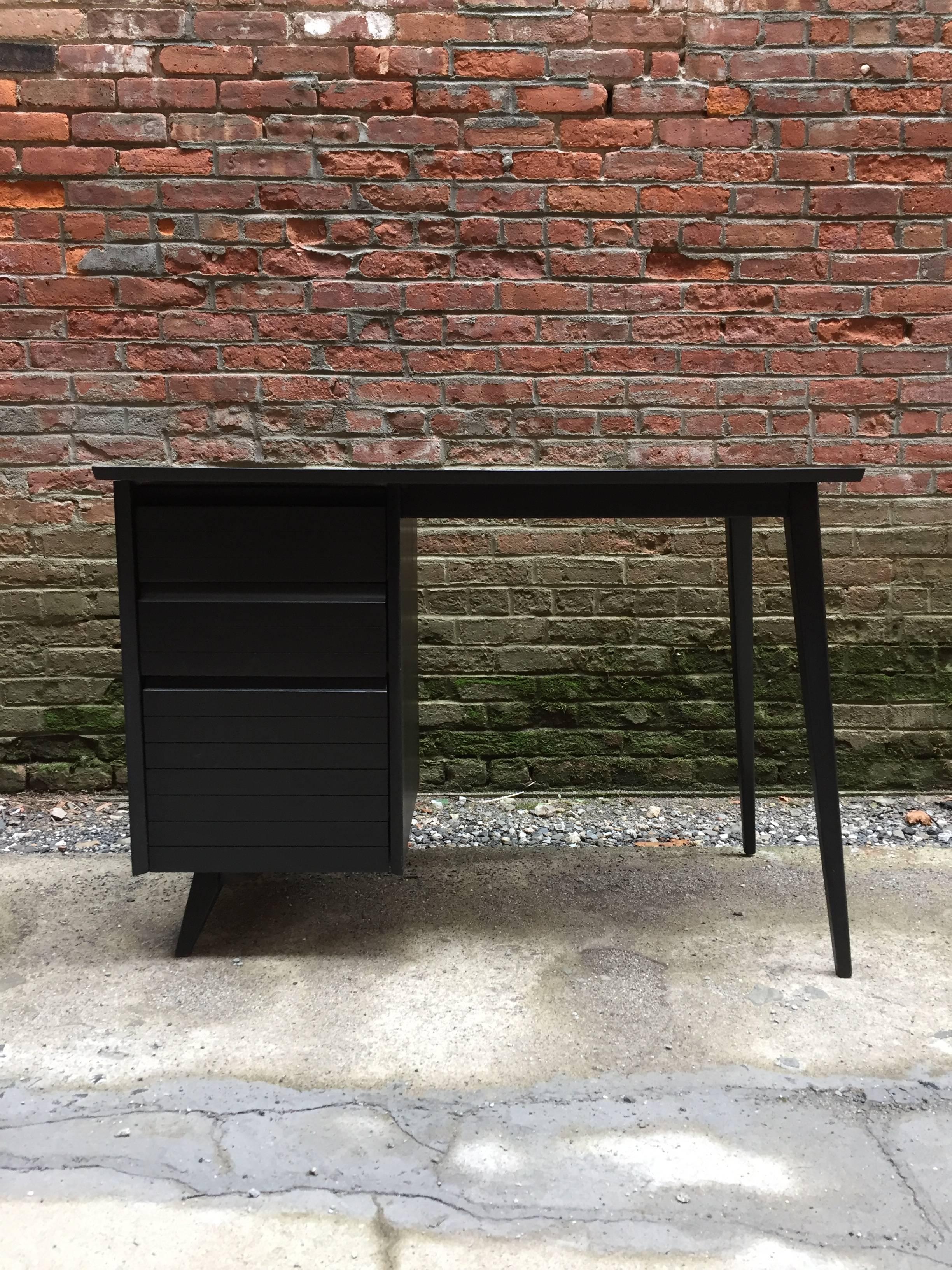 Nice sleek simple design. Three drawer desk that is finished on all sides. New black aqua lacquer finish.  Berge Norman Associates. Unsigned.