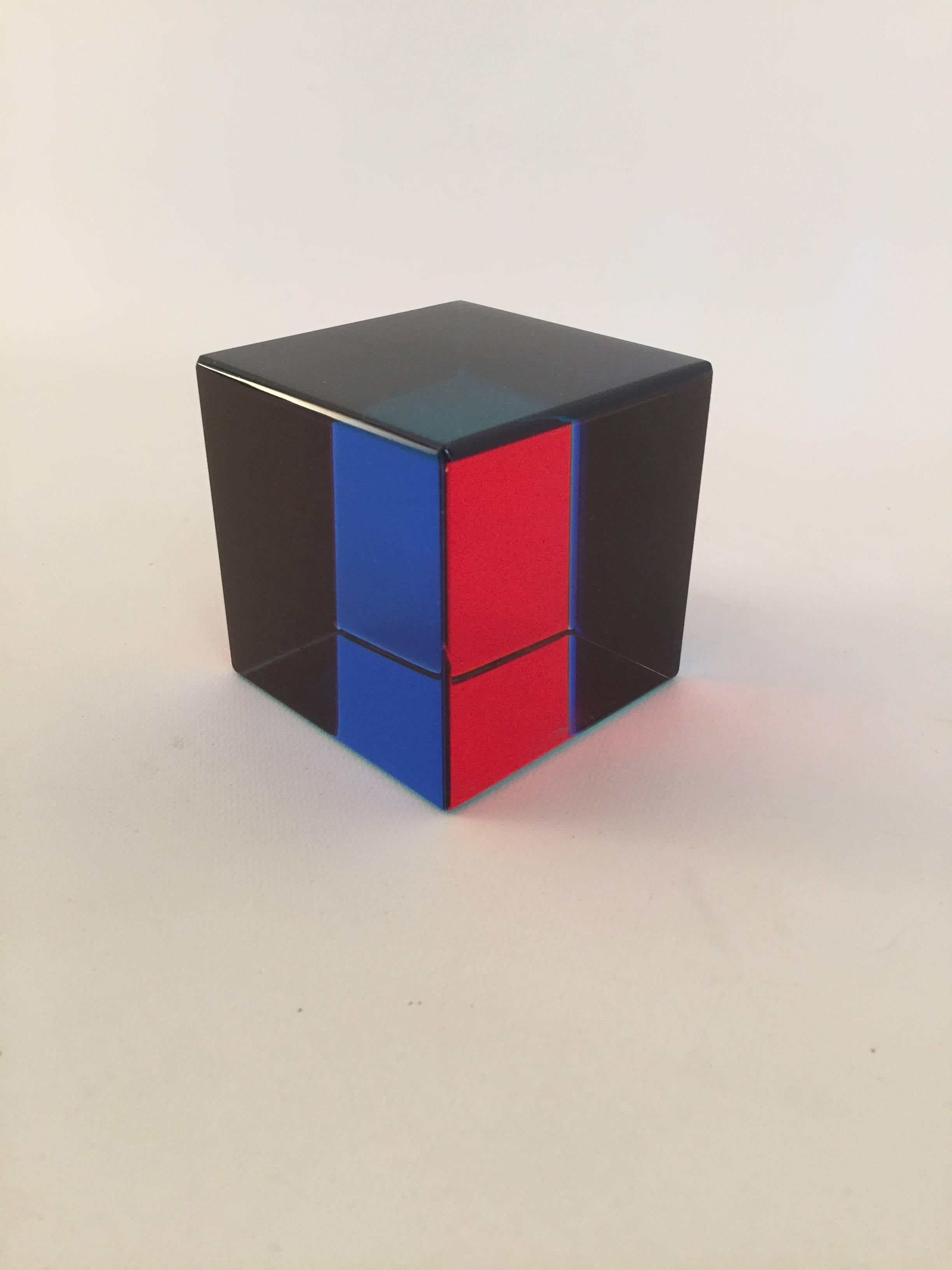 Op Art acrylic cube designed by Yugoslavian artist, Vasa Mihich. Signed and dated, Vasa 2000. Change the viewing angle, change the optical experience. The colors range from black, red, blue and teal.
