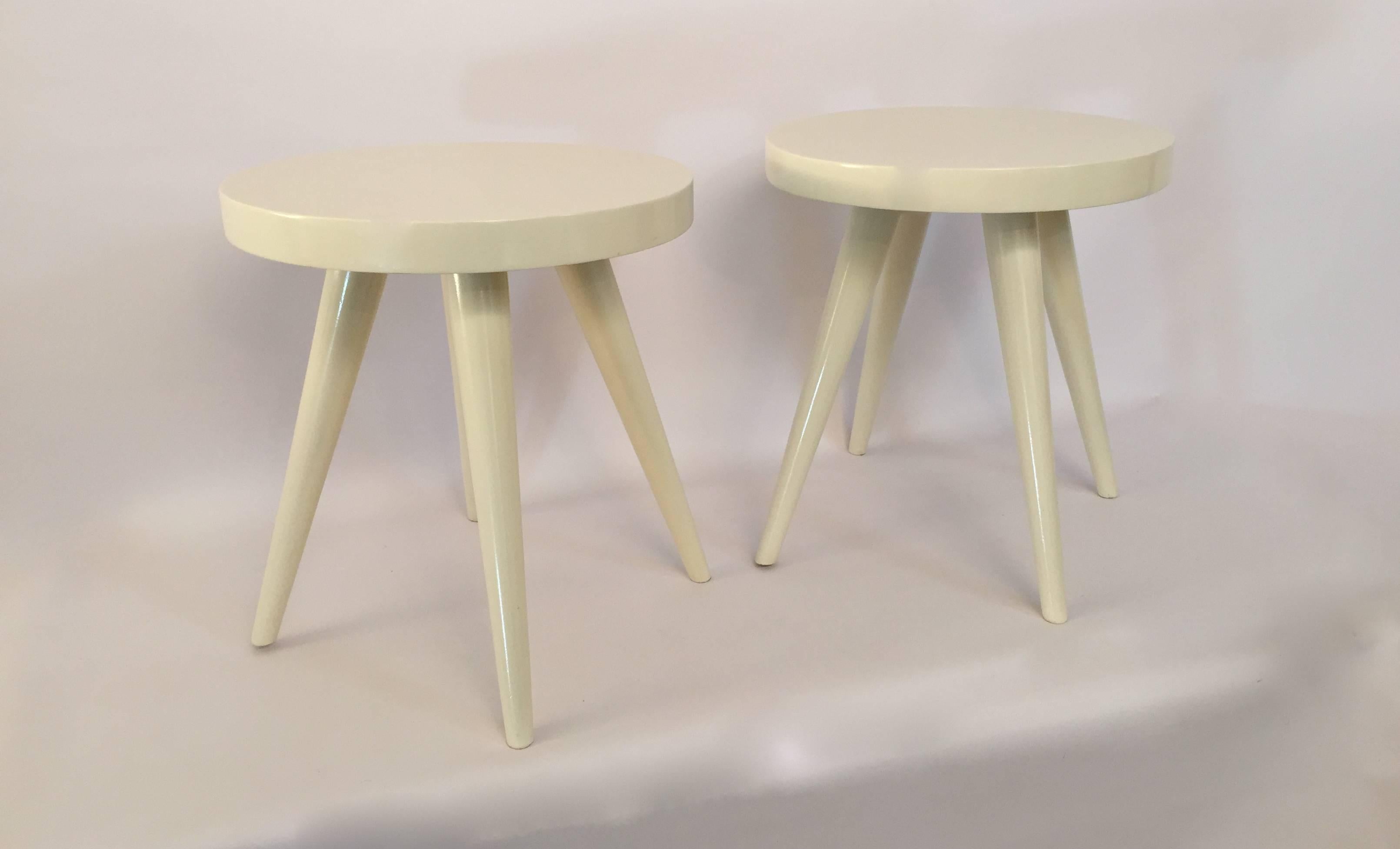 Excellent pair of four legged stools in the manner of Charlotte Perriand, circa 1950-1960. Thick solid wood top and elegantly tapered legs.

Measures: 15.5