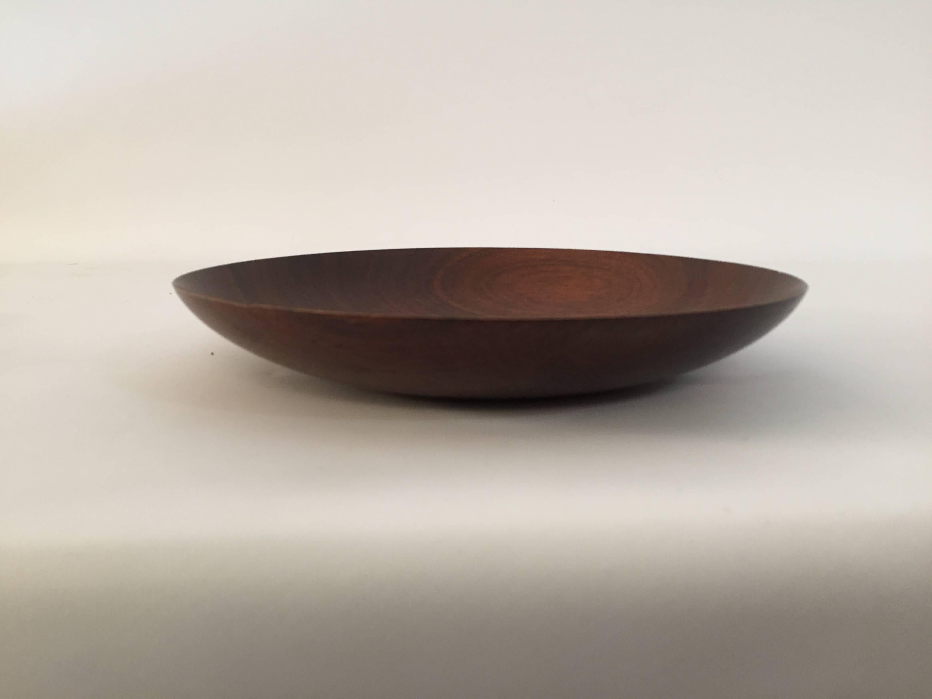 Turned walnut bowl that is feather light with paper thin walls. Exquisite finishing. Signed on the bottom, John Cherry, New Hope, PA. Impeccably hand finished.

Measures: 9.5