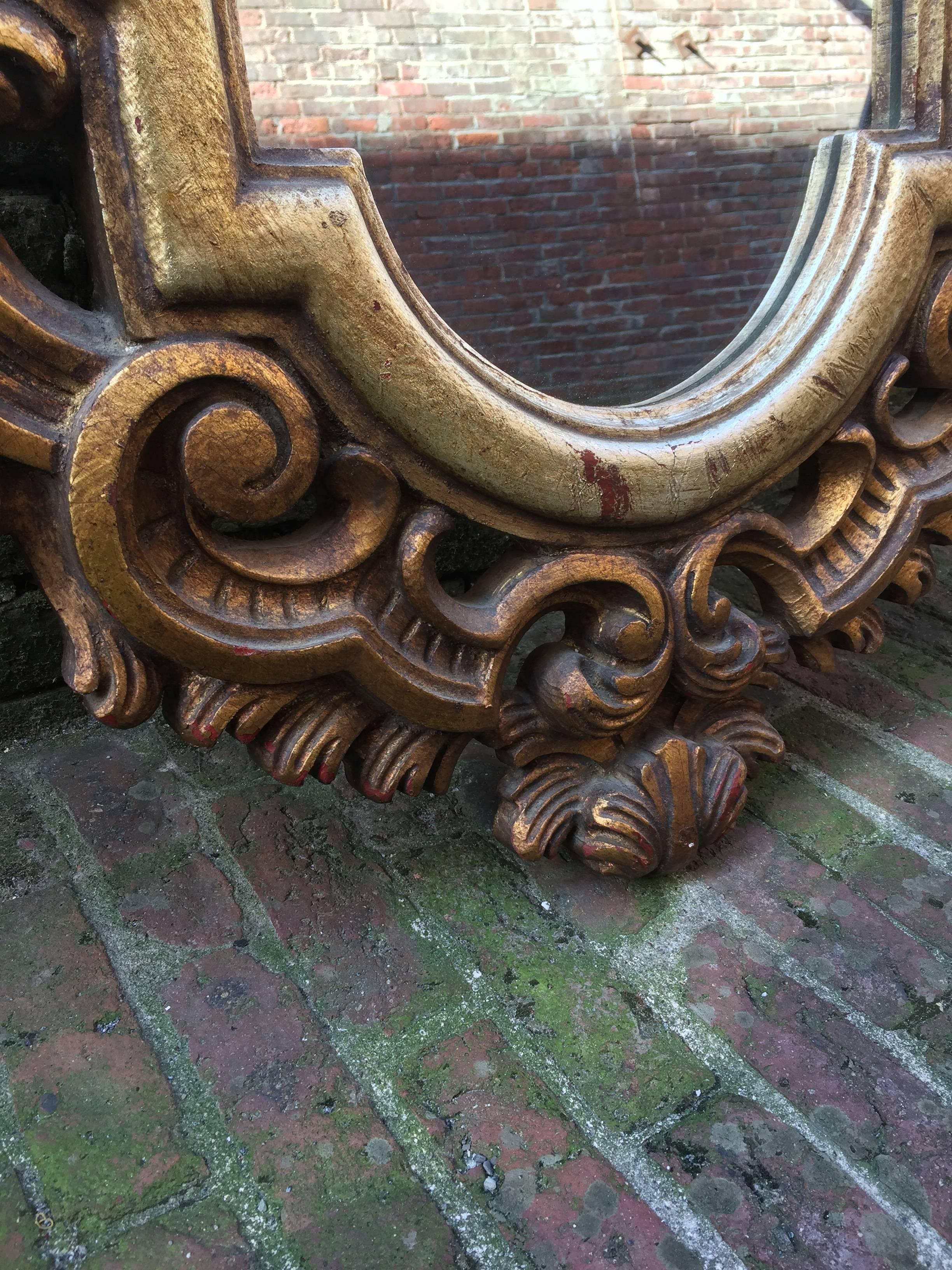 Italian Scroll Carved and Gilded Baroque Style Mirror In Excellent Condition In Garnerville, NY