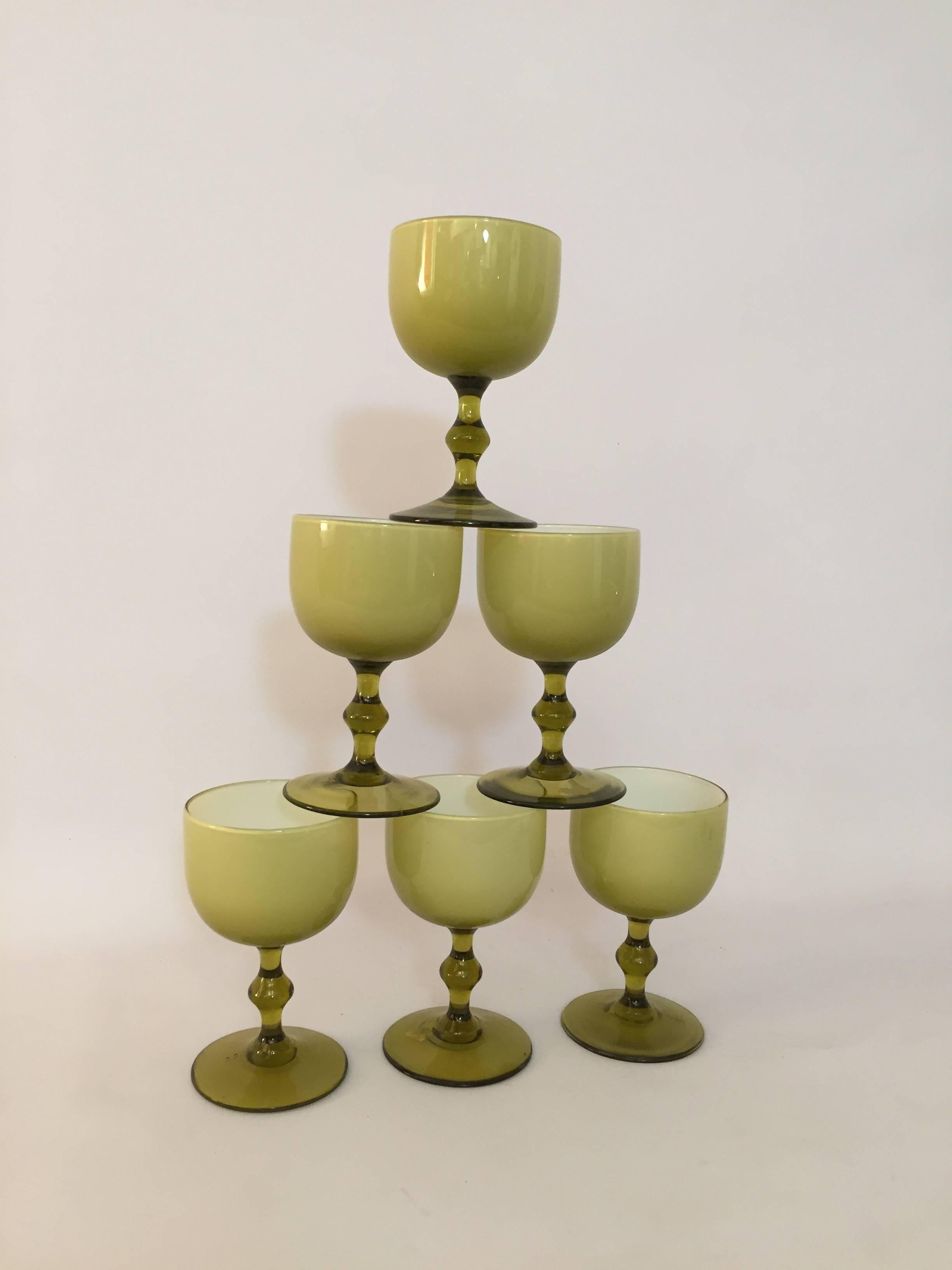 Six cased glass wine goblets designed by Carlo Moretti. These have never been used and some even retain their 