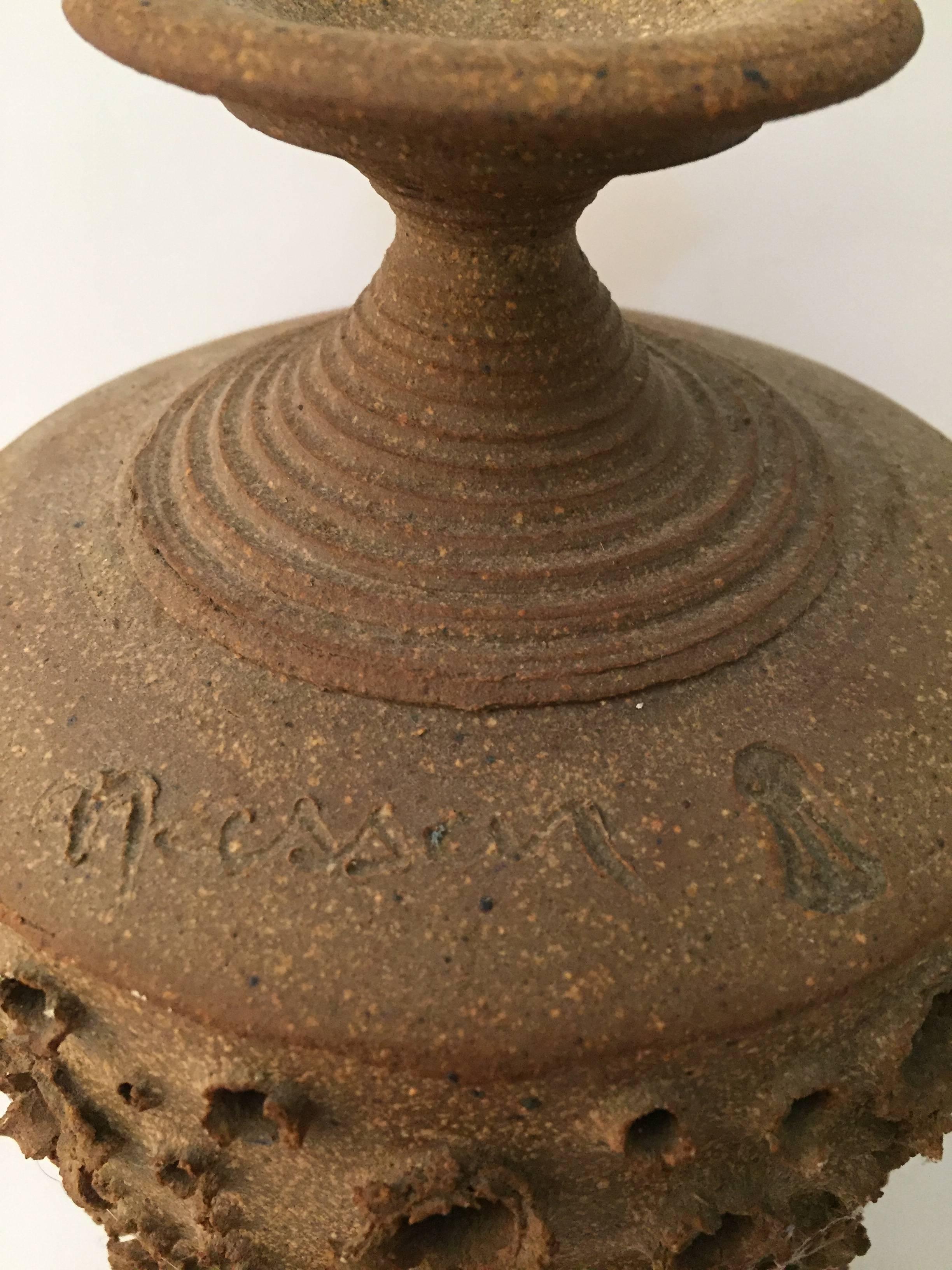 Signed John Masson Studio Pottery pendant light shade. Unglazed stoneware body with pierced and blown out holes to let light escape. Circa 1969. Very good, original condition. A light source need to hung on the inside to make this into a working