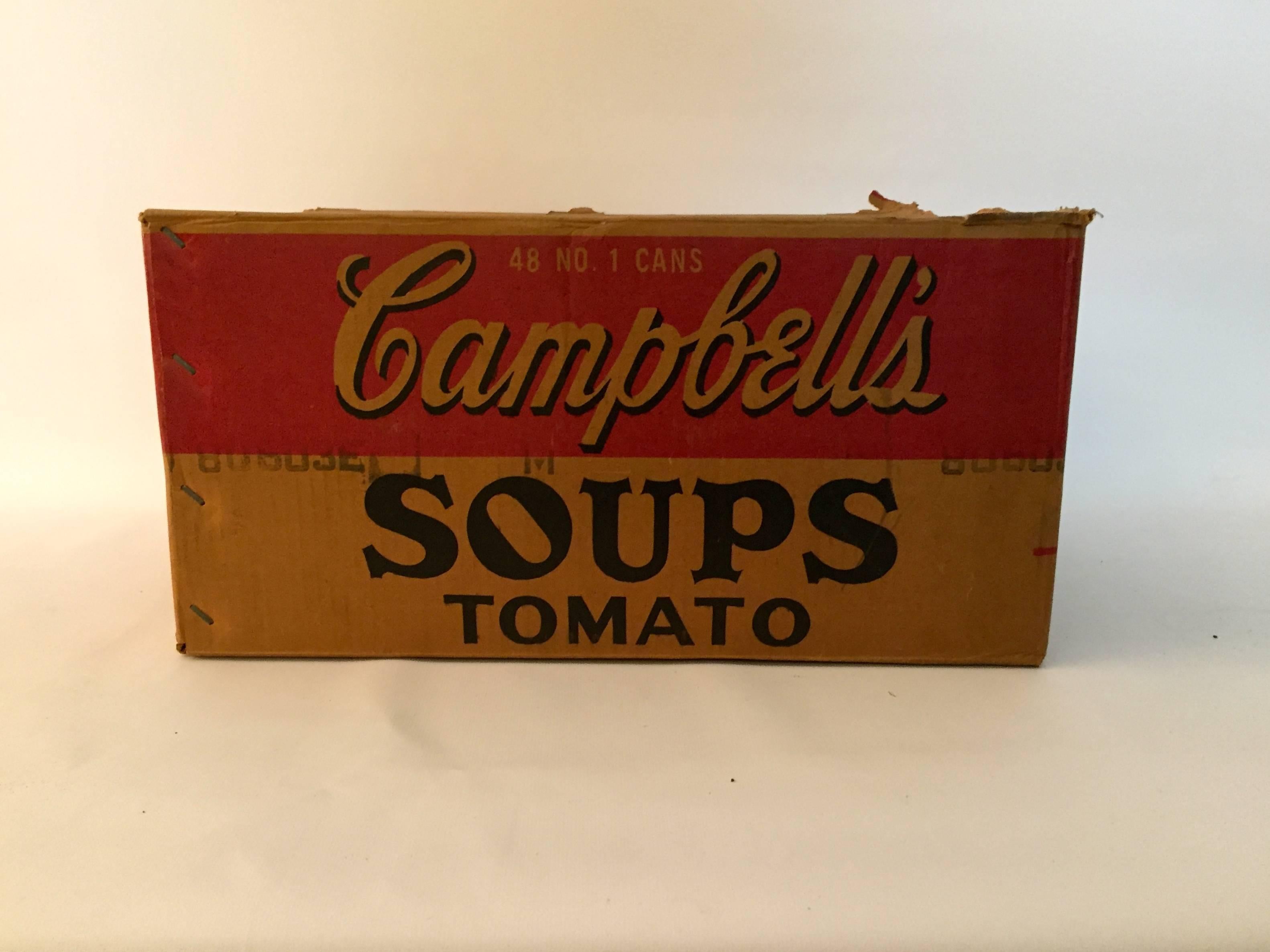 The true inspiration behind Warhol's Pop Art fascination with the everyday graphics that we took for granted during the advertising Boom of the 1950-1960. Cardboard box with vivid Campbell's tomato soups graphics.