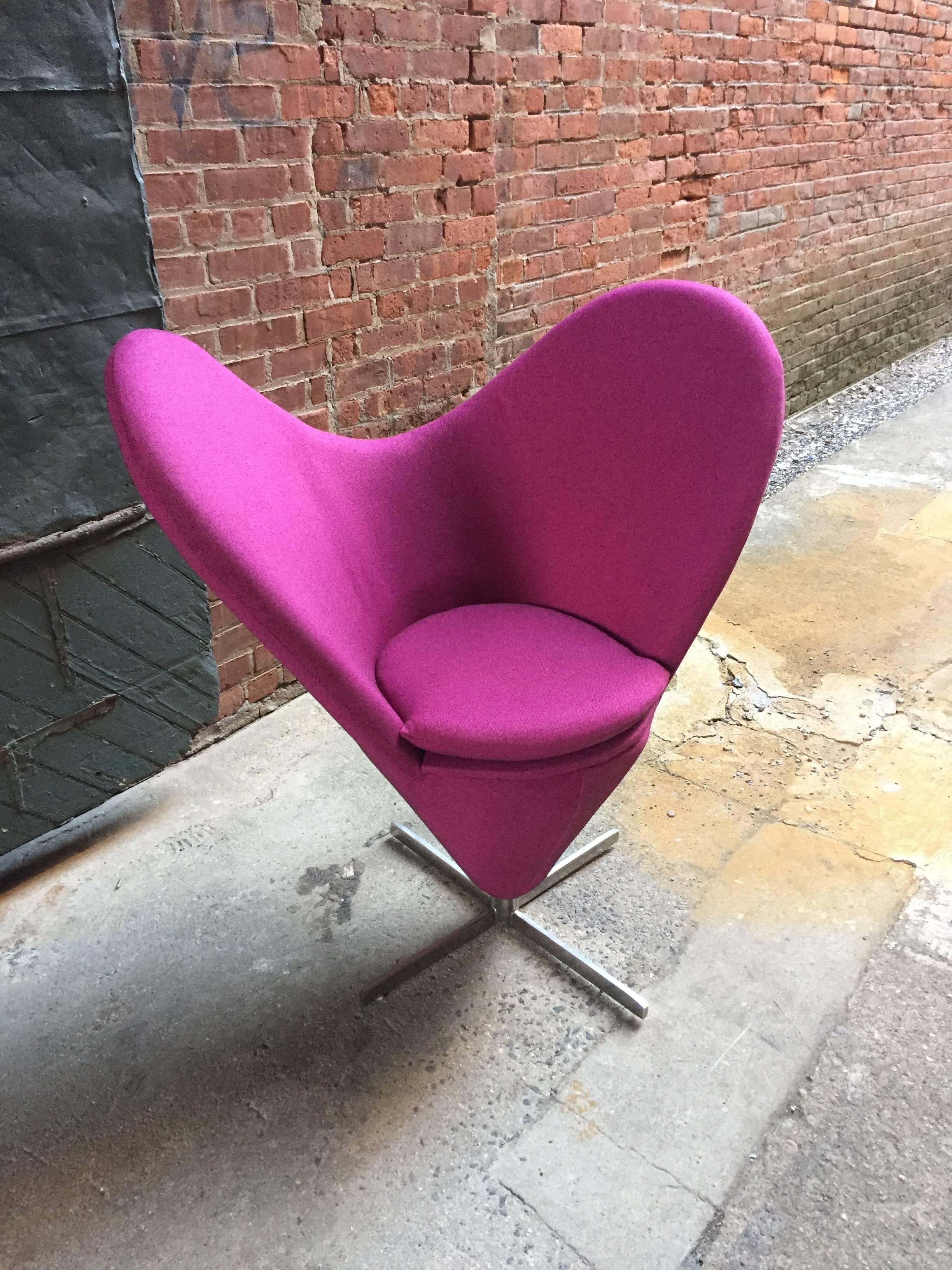 Re-upholstered in a Knoll fuschia fabric. A very nice example and homage to Panton's heart chair, circa 1980.