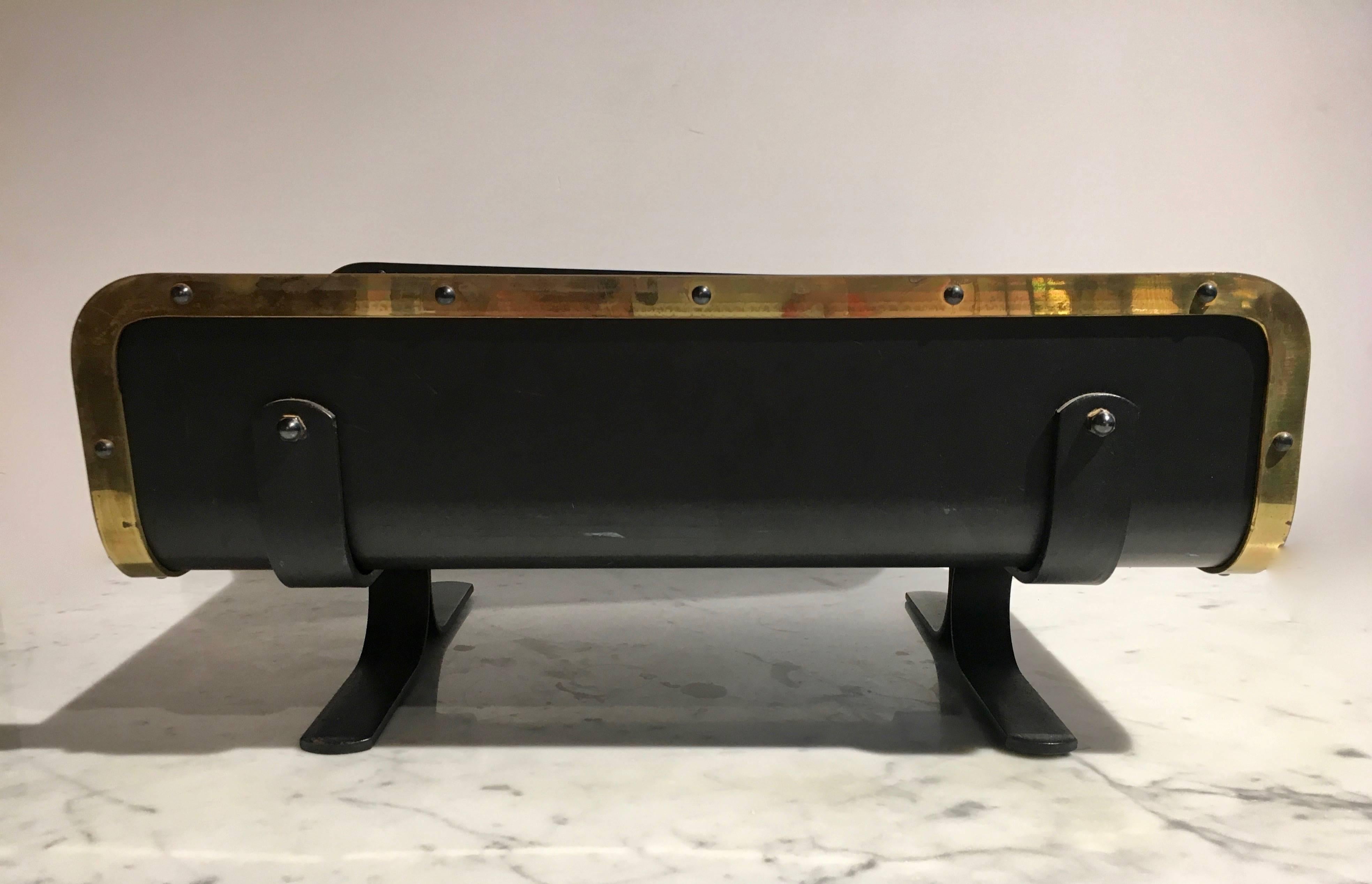 Great capacity metal log holder, in the style of Alessandro Albrizzi or Danny Alessandro, edged in patinated brass, for real graphic appeal. Function and beauty combined.