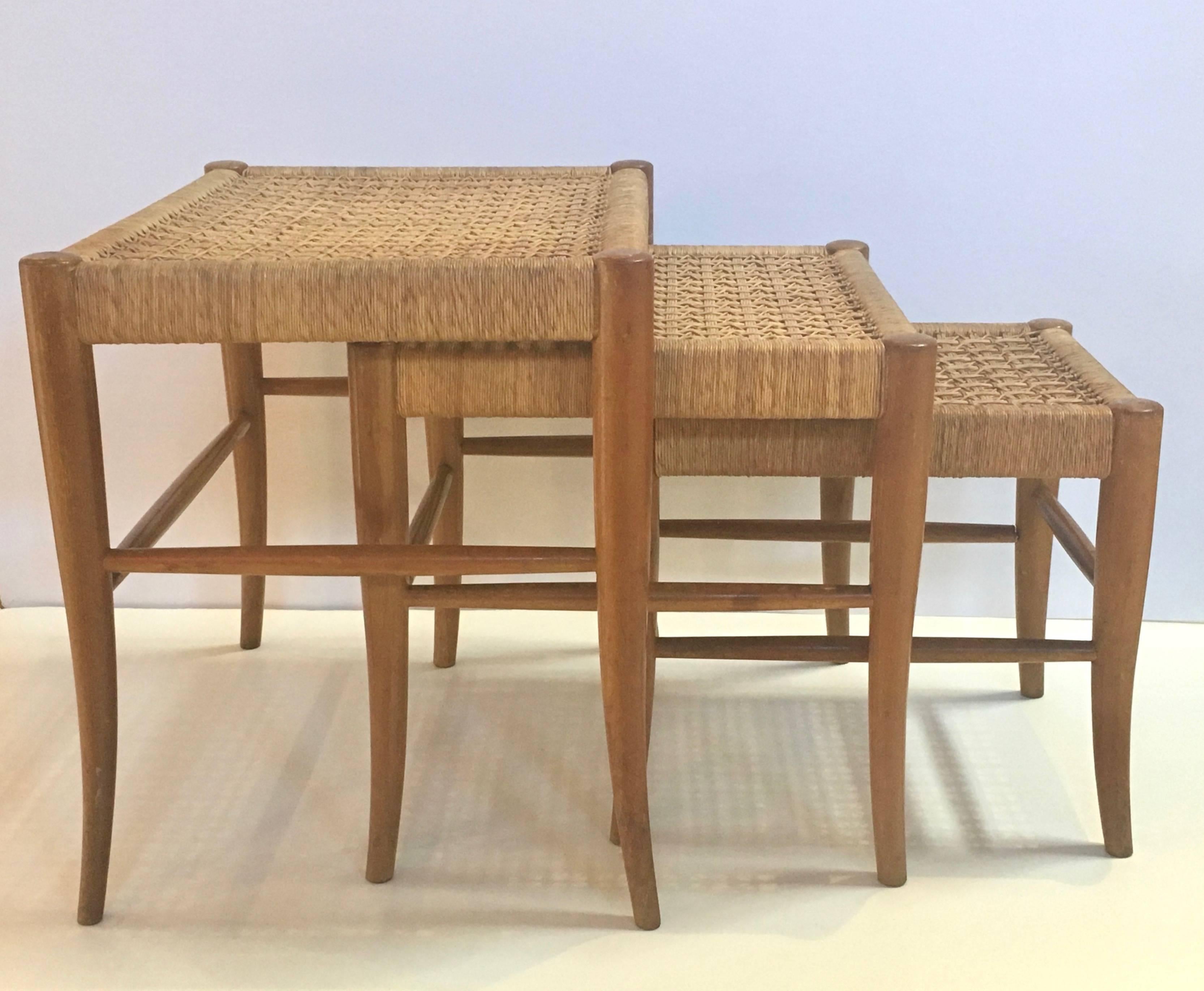 Trio of nesting tables in walnut with flared klismos leg design in manner of T.H. Robsjohn-Gibbings for Widdicomb, Stamped made in Mexico circa 1950s, by AMH company, and purchased in Palm Beach, Fl. 
The largest table measures 20 inches long, 15