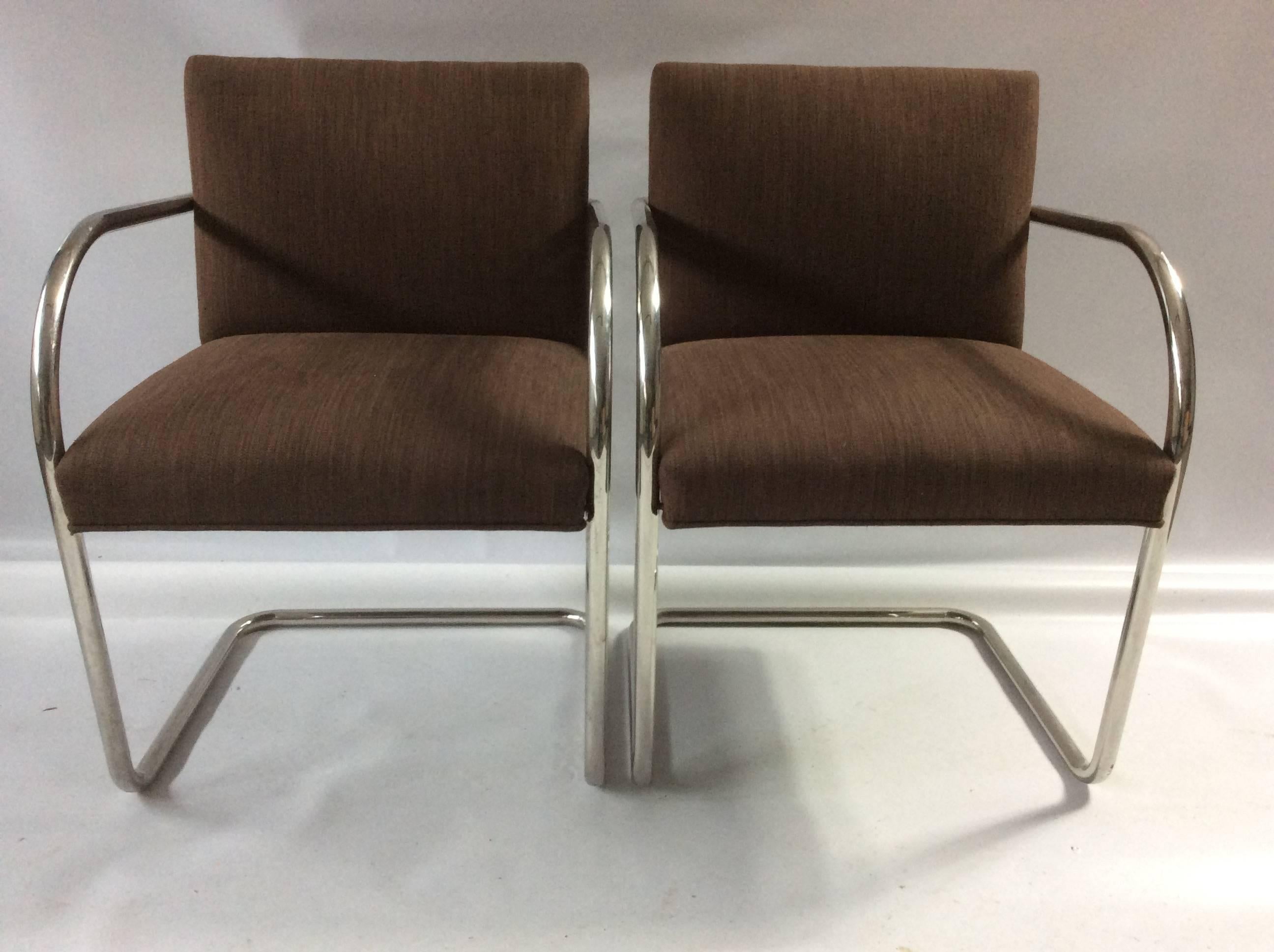 Designed in 1930 for the Tugendhat House in Brno, Czechoslovakia, the Brno chair is a design icon. The cantilevered frame is a single piece of tubular chromed steel. Seats are reupholstered and in nice condition, but not brand new.