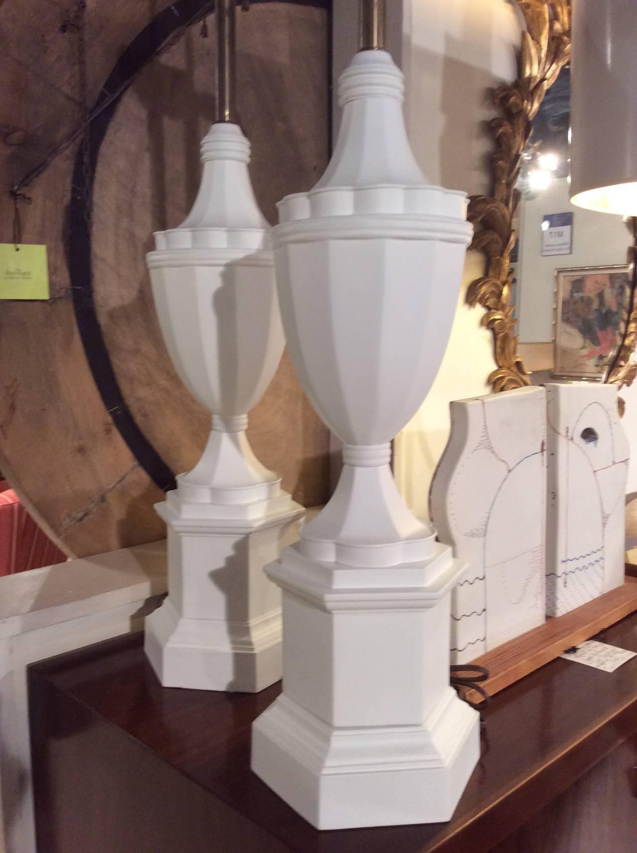 Manner of Serge Roche, John Dickinson or Sirmos fabulous plaster finish, vintage lamps. Tall and sculptural, a pair of vintage lamps with urns atop of a six-sided faceted base, finished in a matte plaster/gesso finish. Newly rewired and new set of