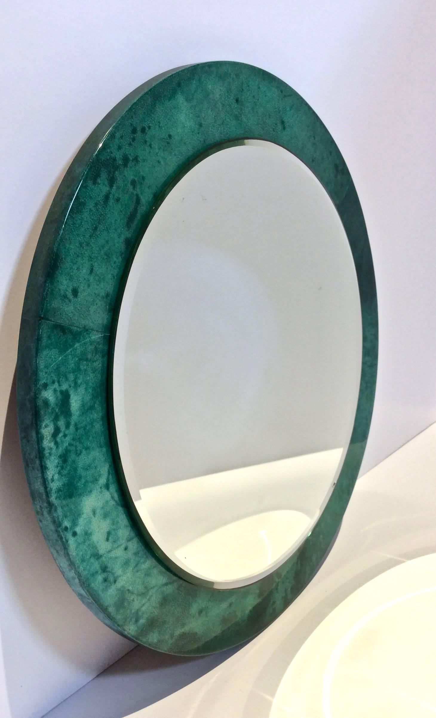 Beautiful mottled green lacquered goatskin mirror (beveled) by Aldo Tura. Original Sticker still intact on back.