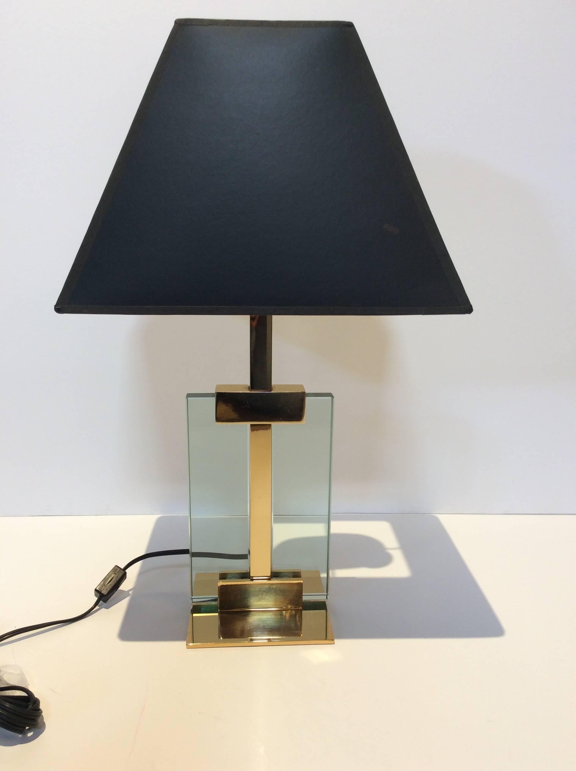 Vintage brass and green glass based table lamp, beautifully patinated and original shade intact. Single lamp in Manner of Fontana D'arte.