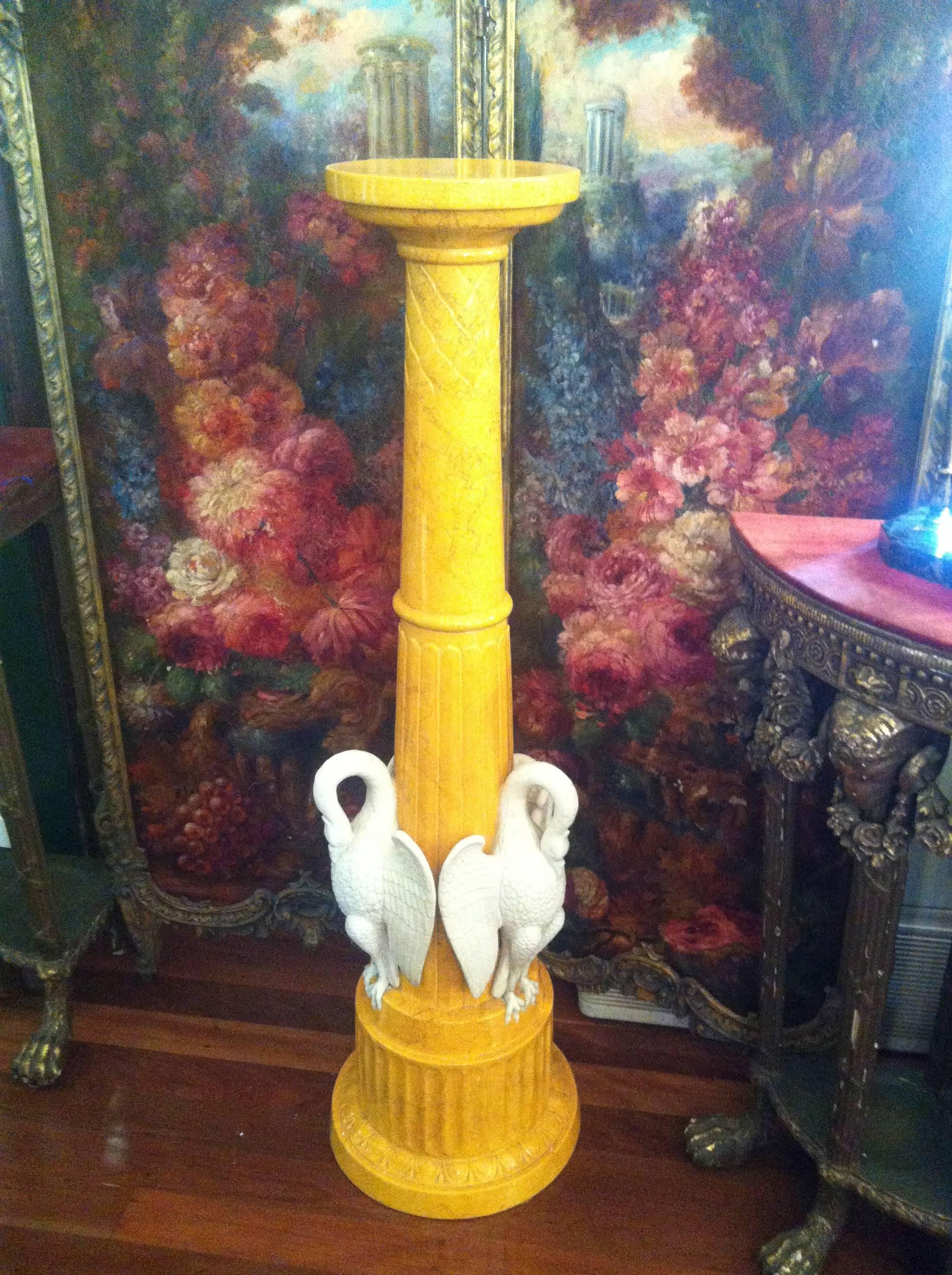 An unusual and rare piece of porcelain by the famed English pottery company Spode. The moulded porcelain column is accentuated by three felspar swans, and is stamped with the Copeland and Garrett mark used on china and earthenware between 1838 and