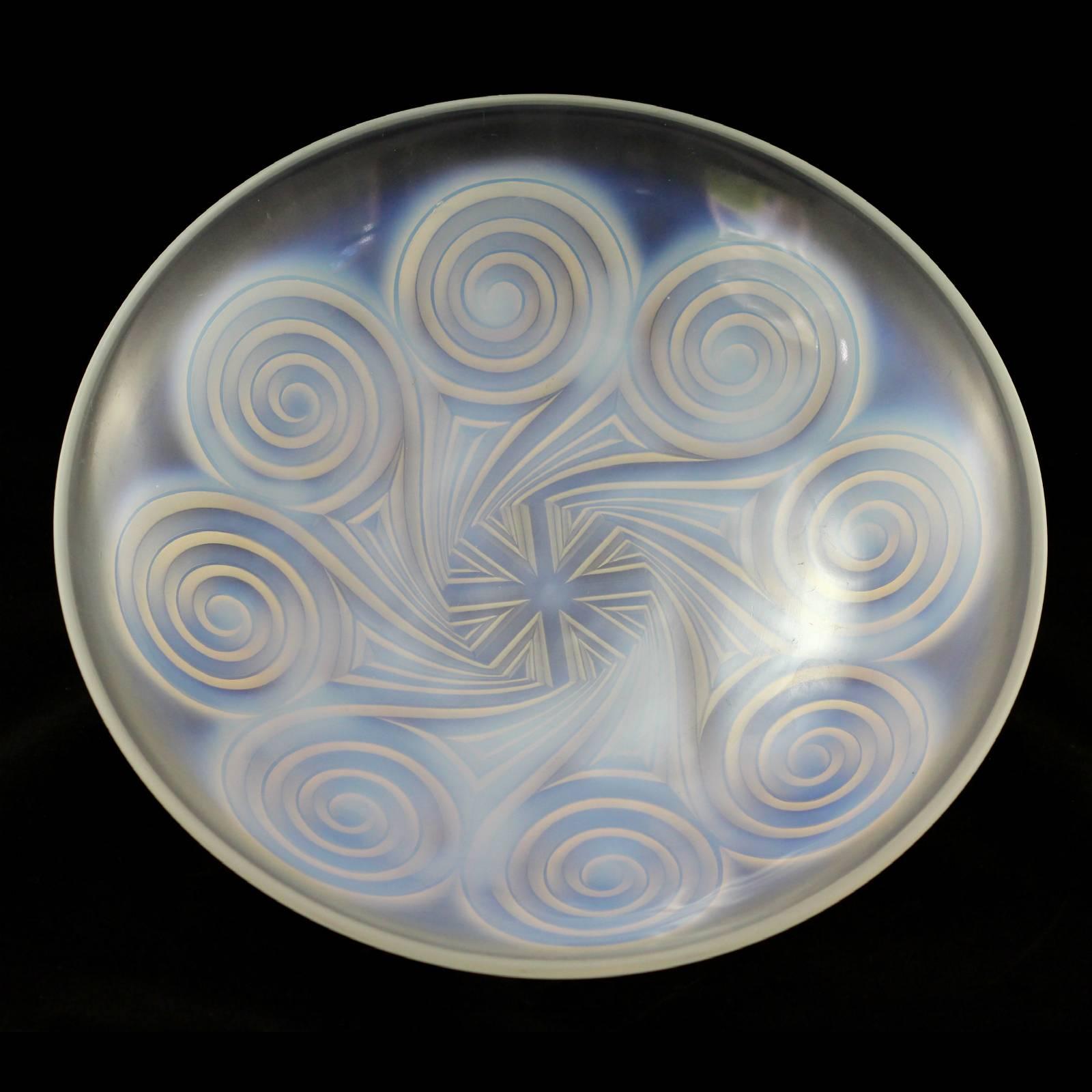 A large flat 20th century Art Deco opalescent glass bowl with swirl pattern by Edmond Etling.