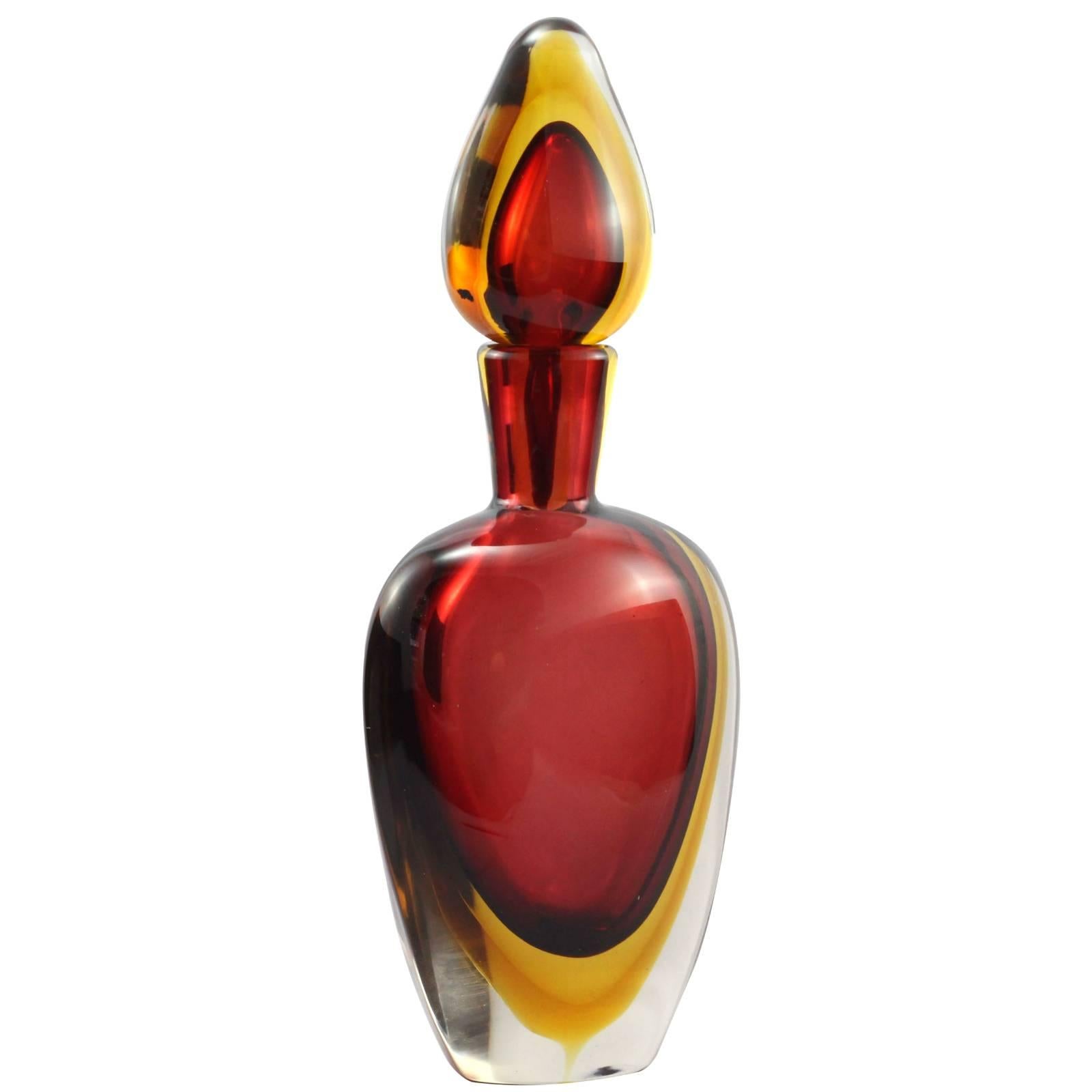 A vintage 20th century red and yellow Murano Sommerso glass decanter attributed to Flavio Poli for Seguso.