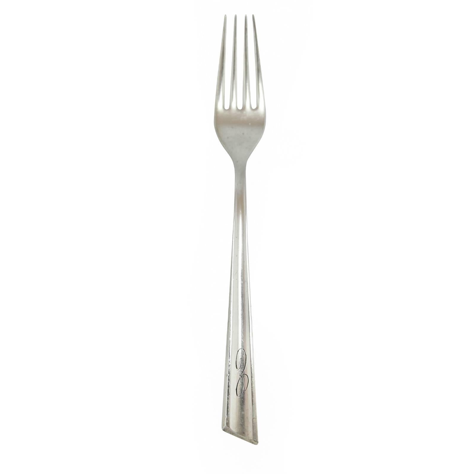 A sterling silver flatware set by Stieff in the ‘Personna’ patten. First produced in 1959, Personna embodies mid century design, and became one of Stieff’s best selling patterns. Stieff was soon purchased by Schofield Co in 1967, which was later