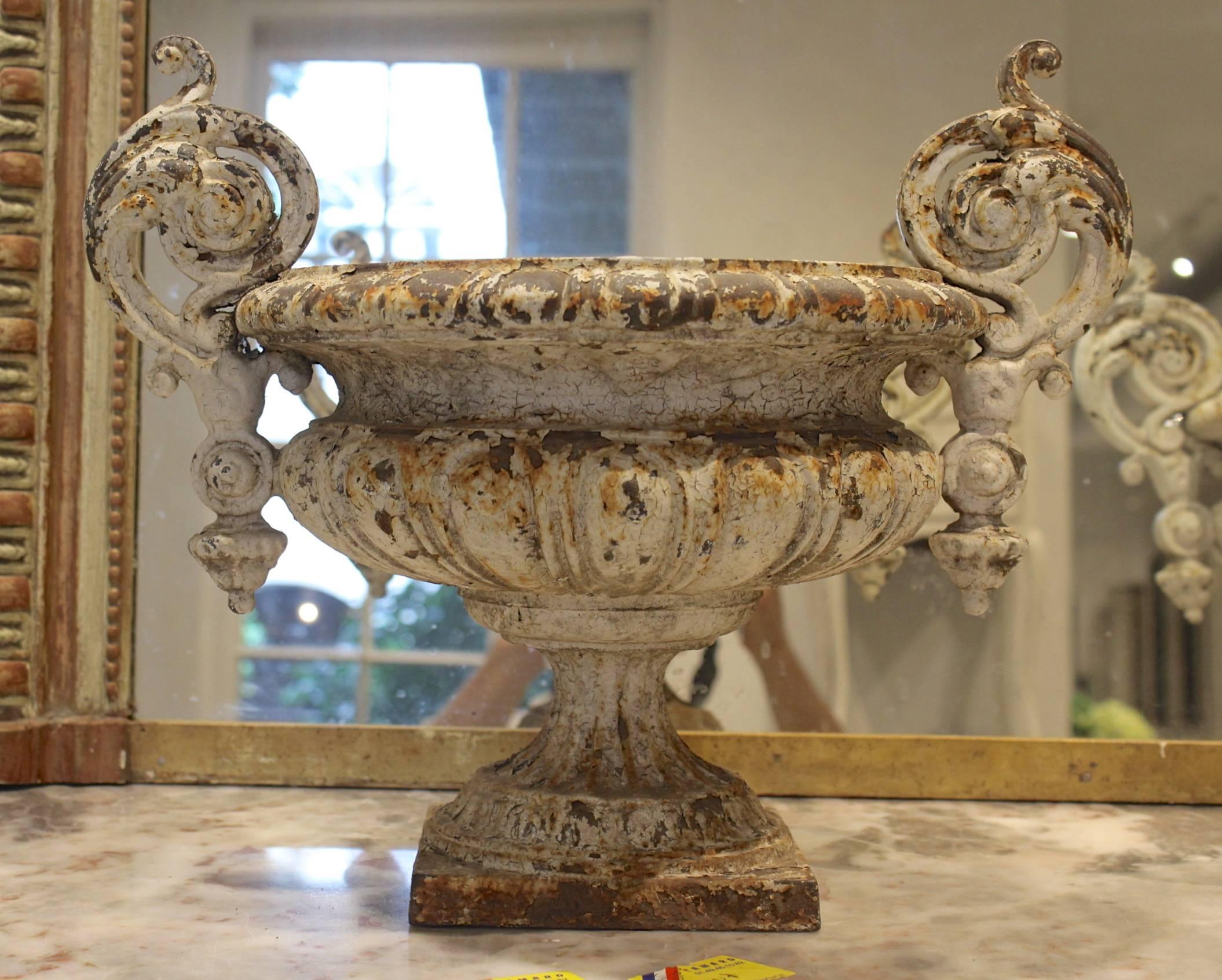 Pair of antique French 19th century cast iron urns.

  