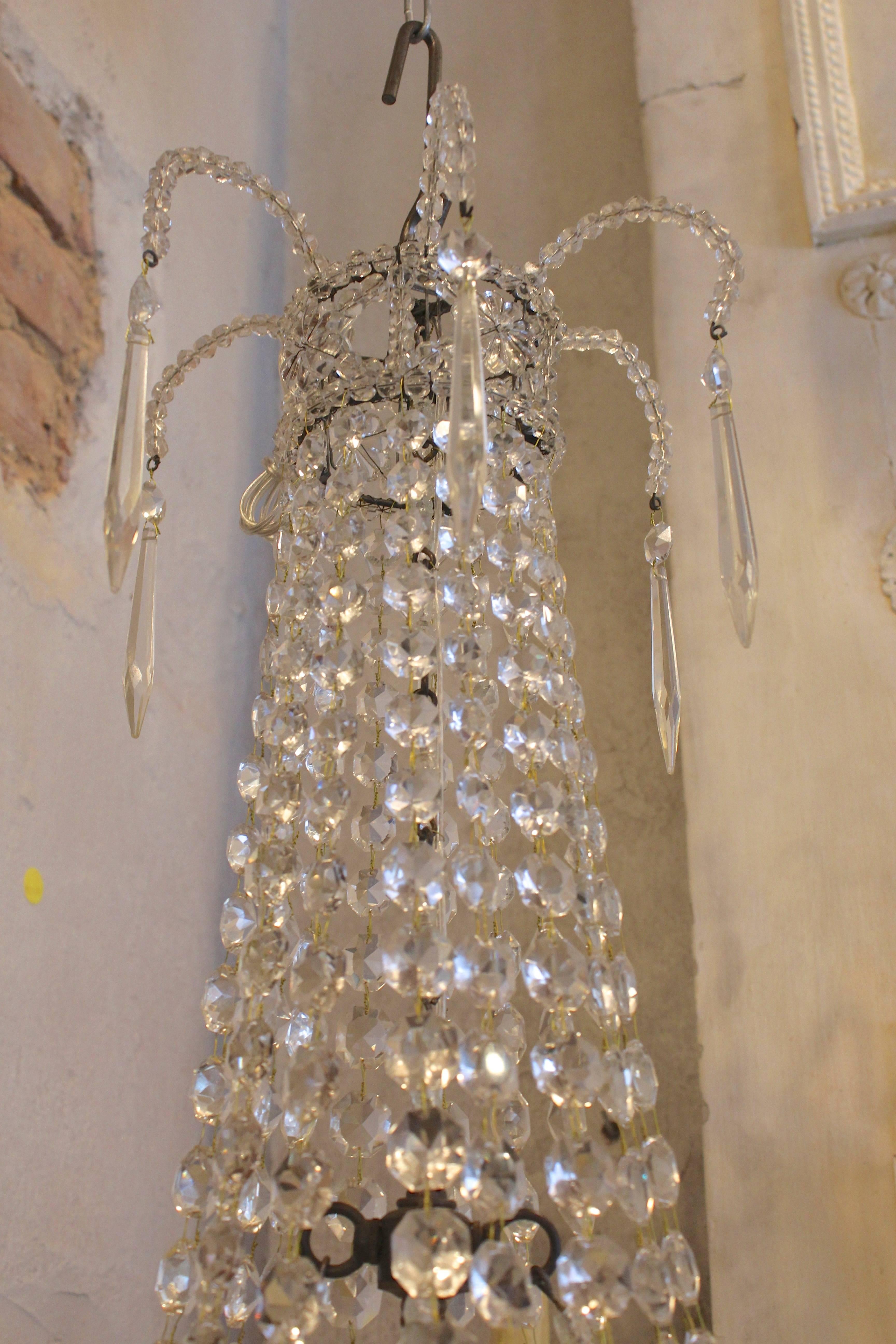 Early 20th century Empire style French crystal chandelier.
 