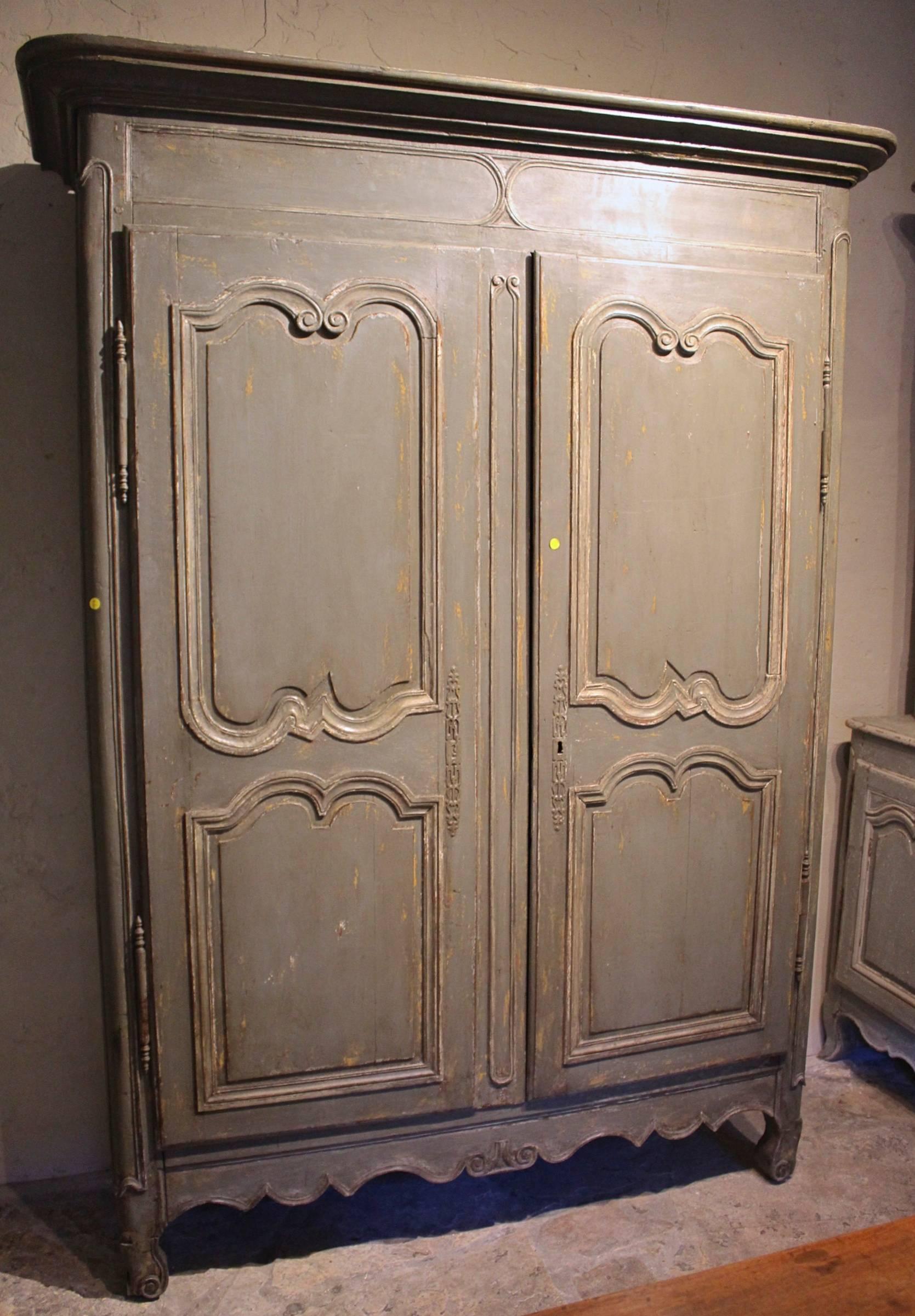 Antique French period Louis XV armoire
End of 18th century
French paint in deep French grey with French wax.
Original Pewter hardware.
 