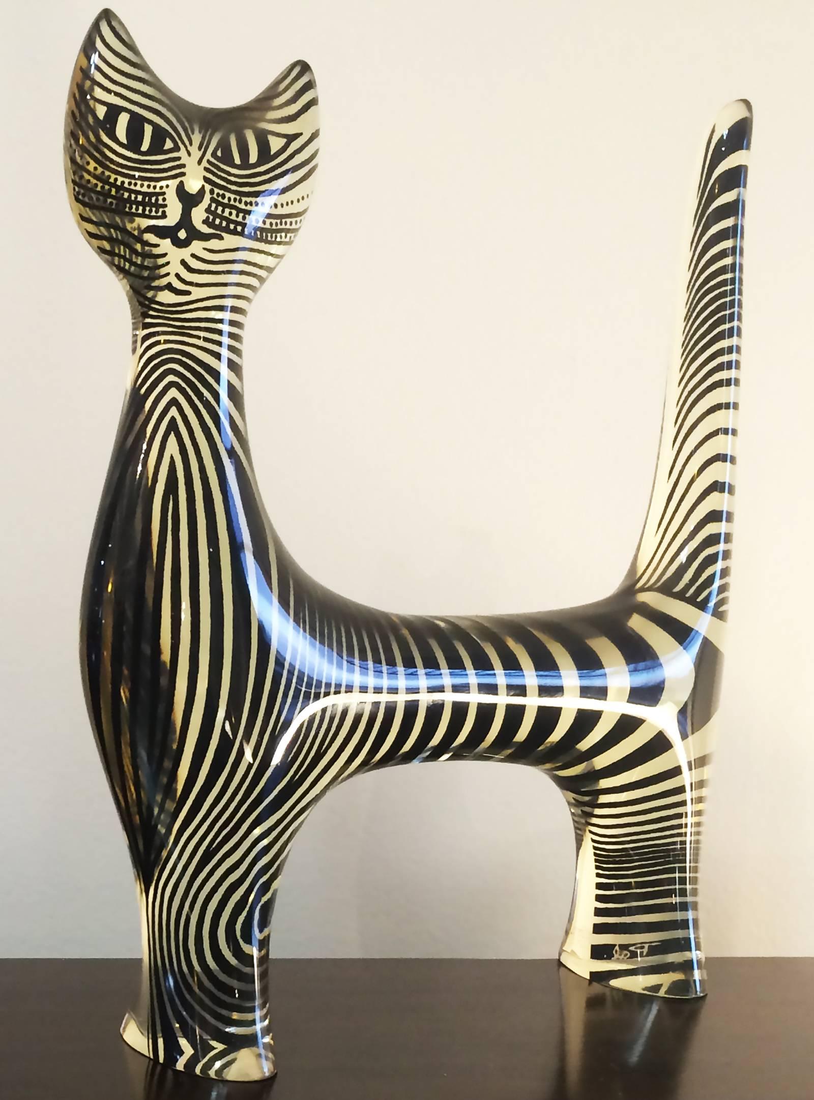 Mid-Century huge optic Lucite cat by the famous maker Abraham Palatnik. This is the more unusual design with the cat in a standing position. The central flat image of a cat made up of only lines and dots. The distortion of the light hitting the