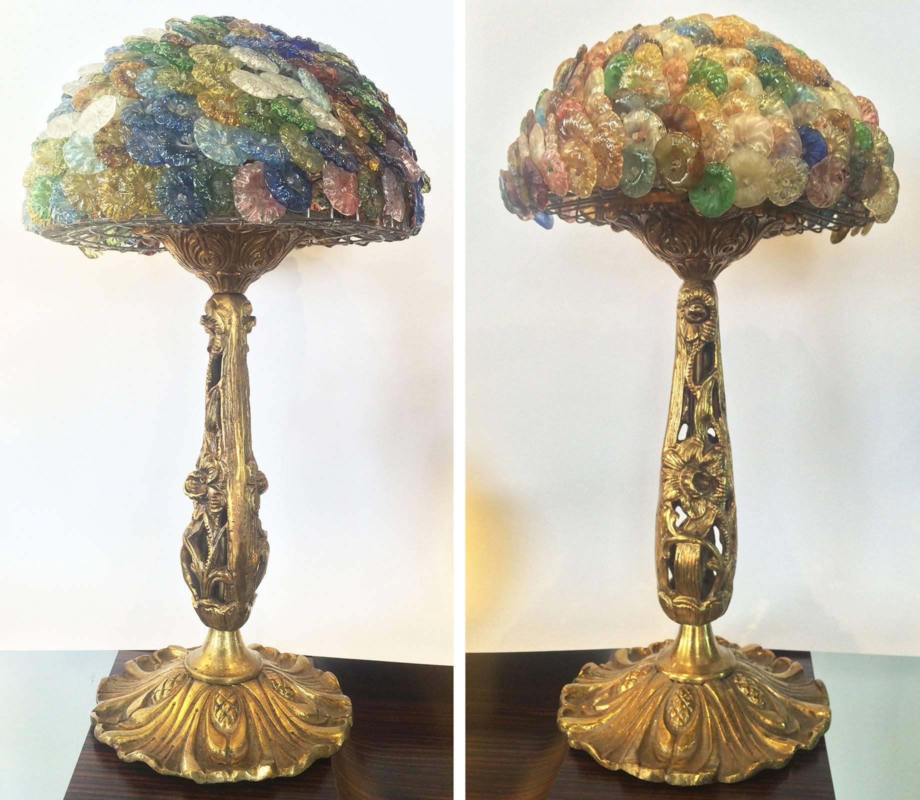 Art Deco lamps, amazing pair, “Tree Trunks” in bronze, filigree with flowers and vines up the trunk, and pine cones and needles at foot. Many Czech Art glass blossom/flowers at crown. The hundreds of handmade glass decorations, are tied to a metal
