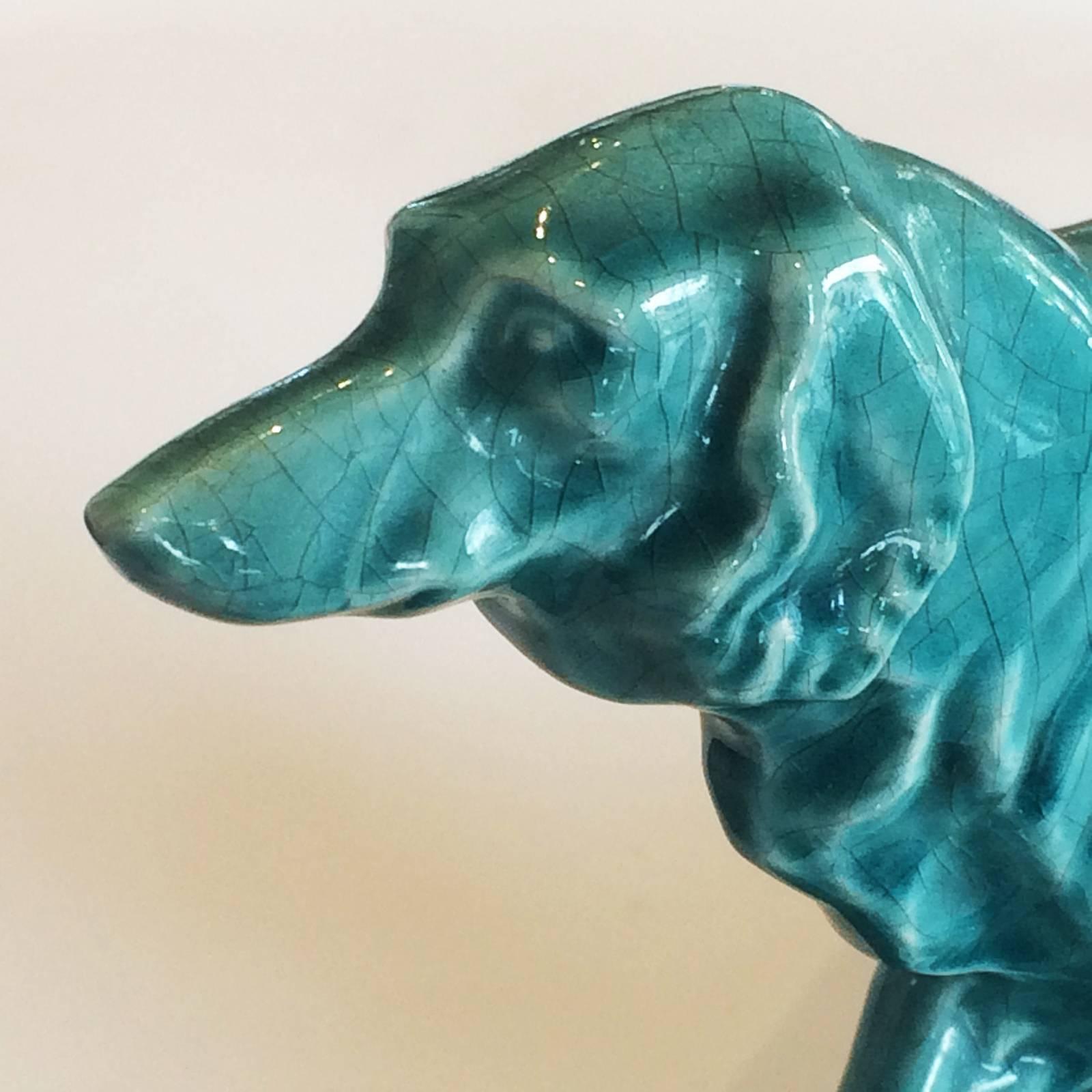 Art Deco statue of a French Borzoi dog, in blue craquele finish. Signed to the rear bottom plinth “LEJAN”. The dogs facial image is captured perfectly, and the proportions are excellent. Condition is excellent with only a tiny “pinhead” of glaze off