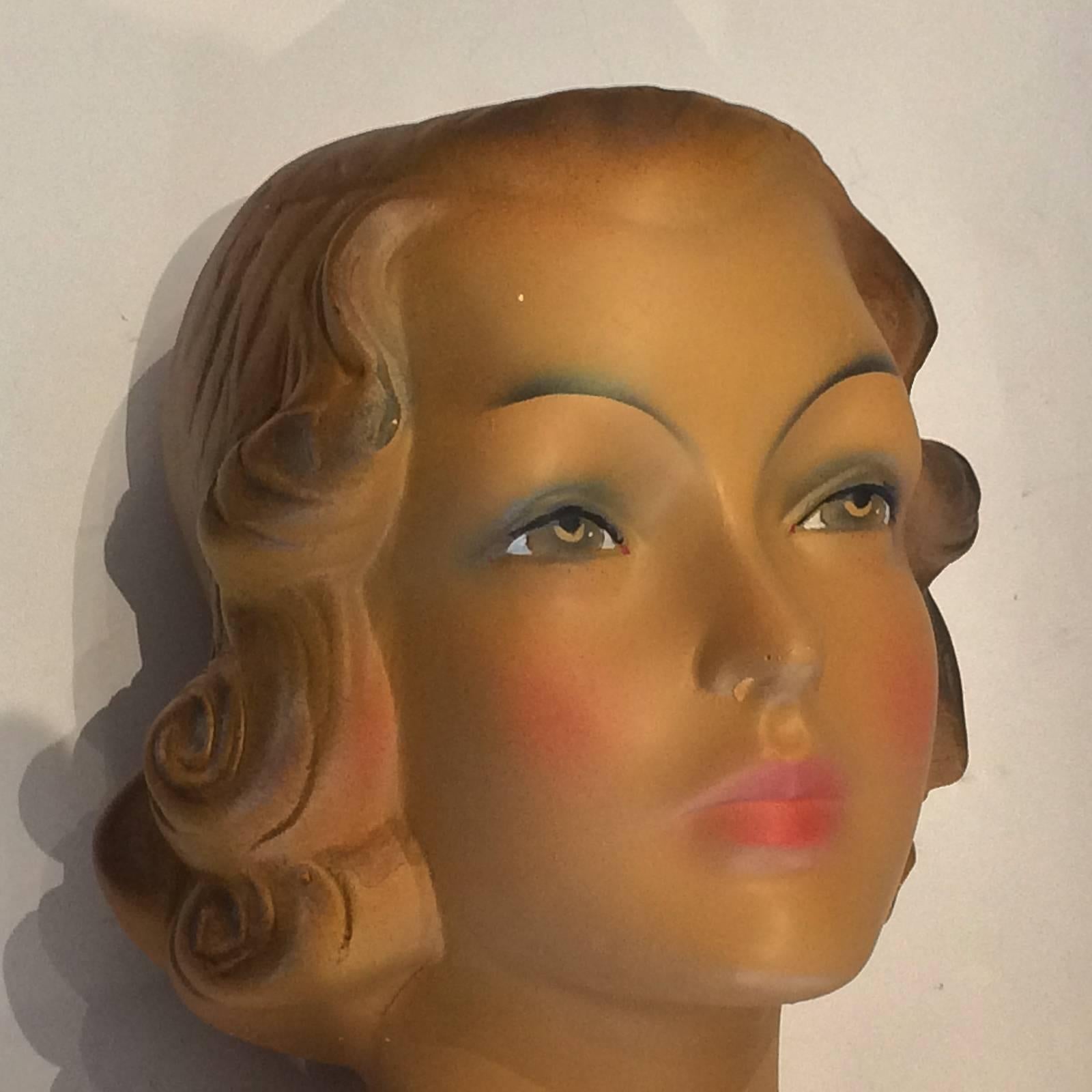 Art Deco French mannequin or publicity bust for Magasin, the French Department Store. Incredibly lifelike, finely detailed, with black ink print, “Champs Elysee’s” over “PARIS” to front, just below neckline, and also “M63 NOVNA”(?) is raised to the