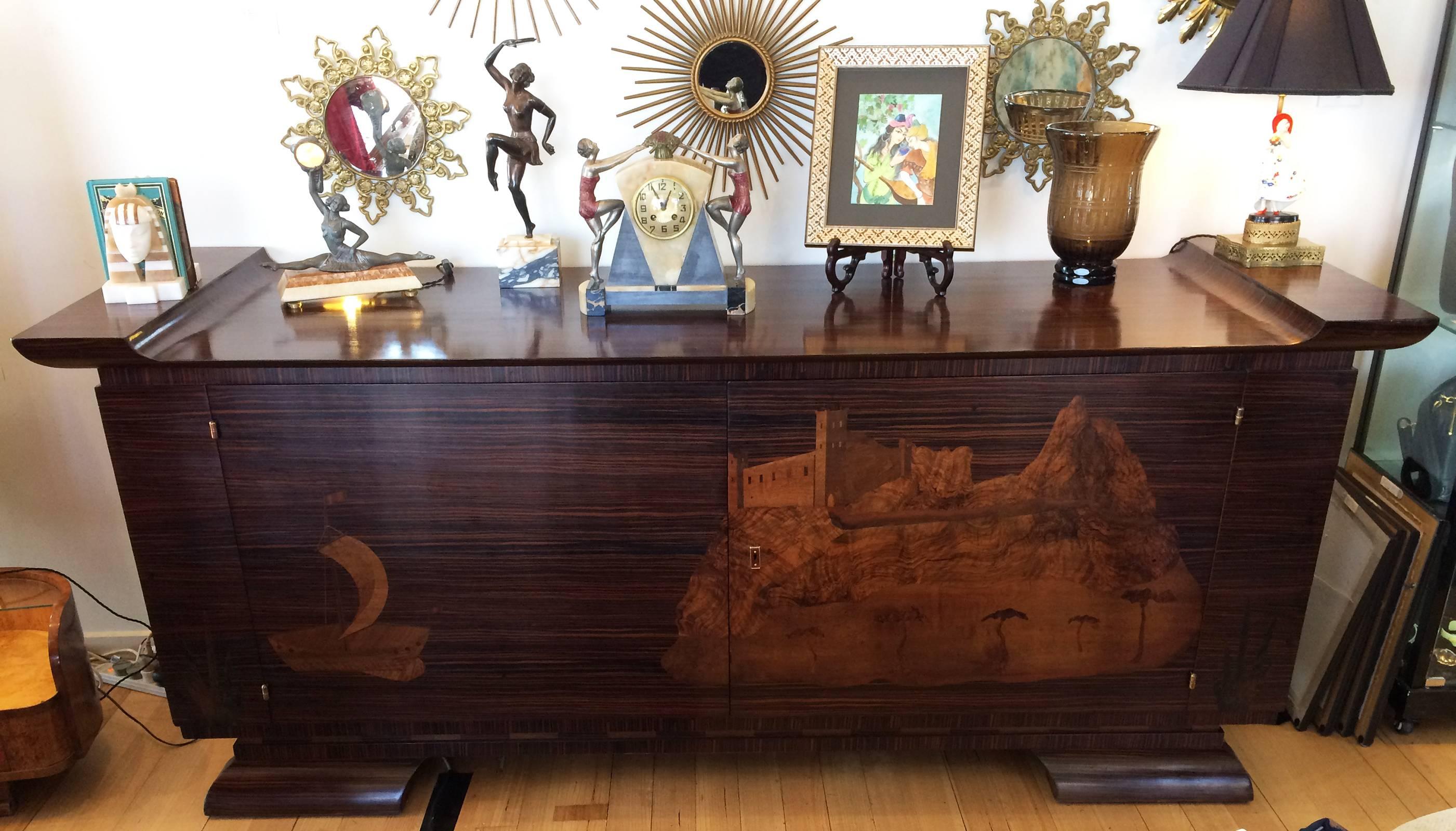 Art Deco, Czechoslovakian Large Sideboard in Macassar Wood with huge, finely detailed inlay of Castle, mountains, Lake and Sailing boat. This is a magnificent example of extensive work to create something outstanding. There are two front doors and a
