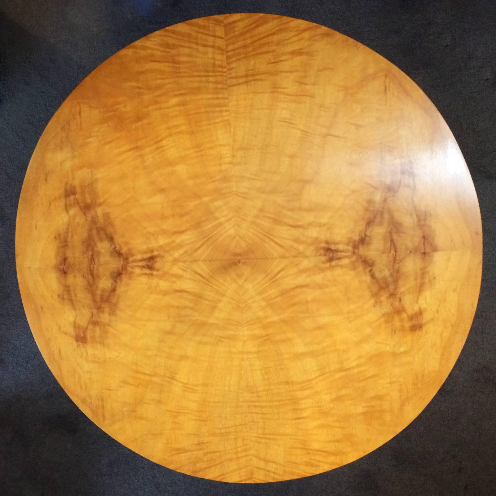 Art Deco round coffee table, triple column with triple stepped base on three cabriole toes. Impressive grain and attention to detail. All in excellent condition, no damage, no losses or repairs. Dimensions are approximate: 60cm diameter top x 40cm