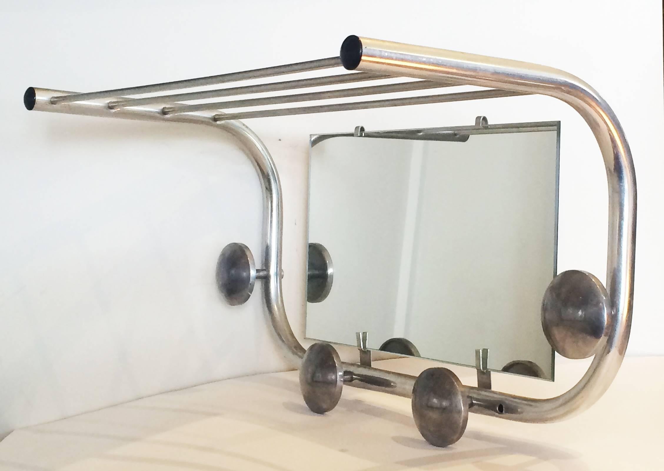 Art Deco polished aluminium wall rack for hats and coats, and fitted with mirror. All excellent condition, no damage or repairs. Perfect for the entrance hallway for incoming hats and coats. Dimensions are approximate: Frame, 44cm wide x 24cm high x
