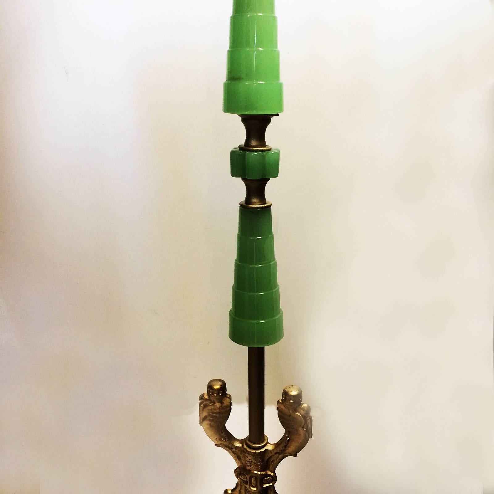 Art Nouveau American bridge lamp, with Jadeite glass, with Egyptian influence, having stepped Pyramids in all of the glass column and base components, and the lowest two gilt areas look like Sphinx. Metal work is gilt on iron with brass electrical