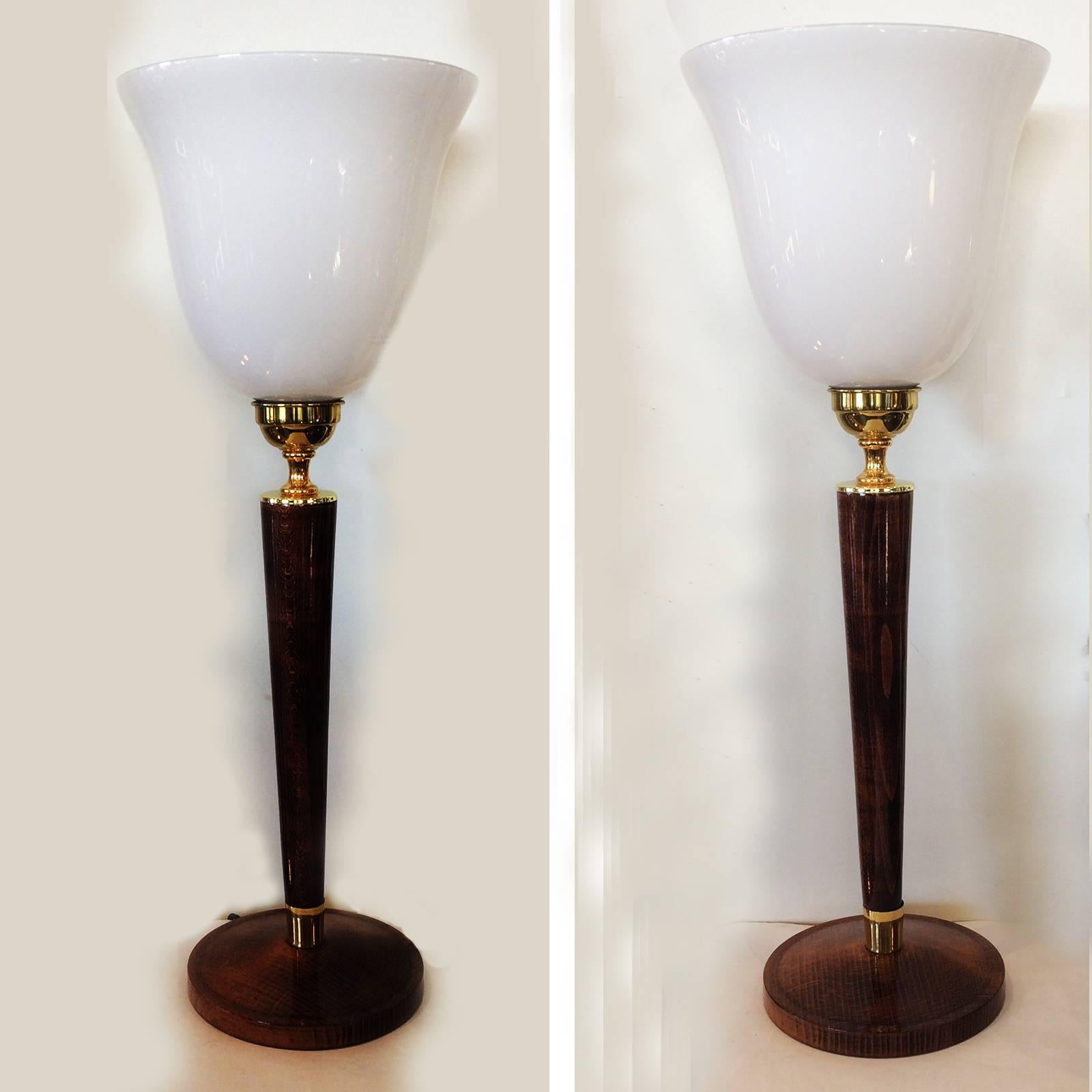 Art Deco pair of lamps by Mazda, France these lamps are immaculate with no damage to either glass, timber or gilt metal fittings. They have an in-line, di-pole safety switch, being re-wired to Australian Regulations, but could easily be converted