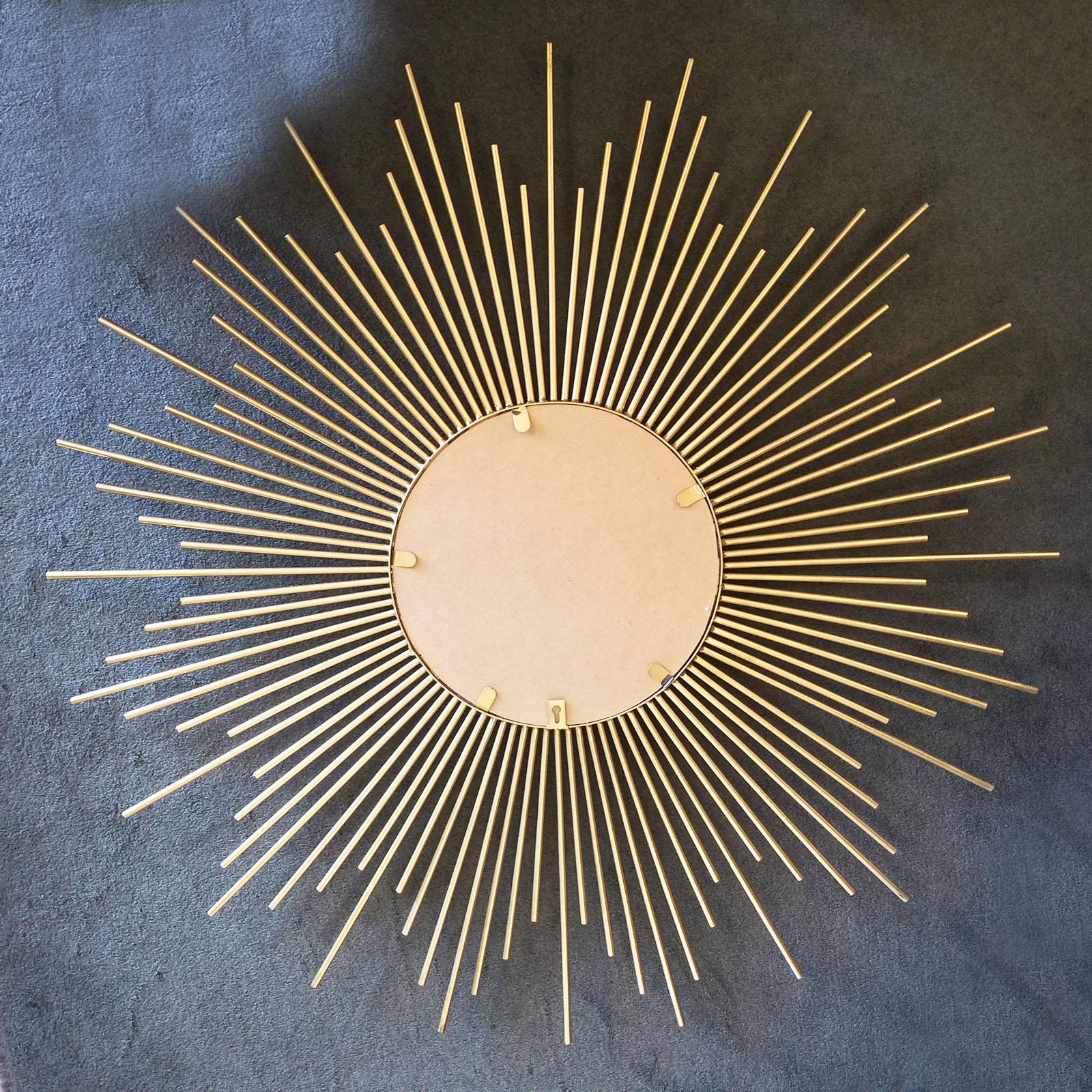 Midcentury large solid ray sunburst convex mirror. The old Commercial style “Mirror Sorciere’” (French), or “Magic Mirror” Immaculate condition, with no damage or deterioration to mirror, with the back being replaced in recent years, still perfect.