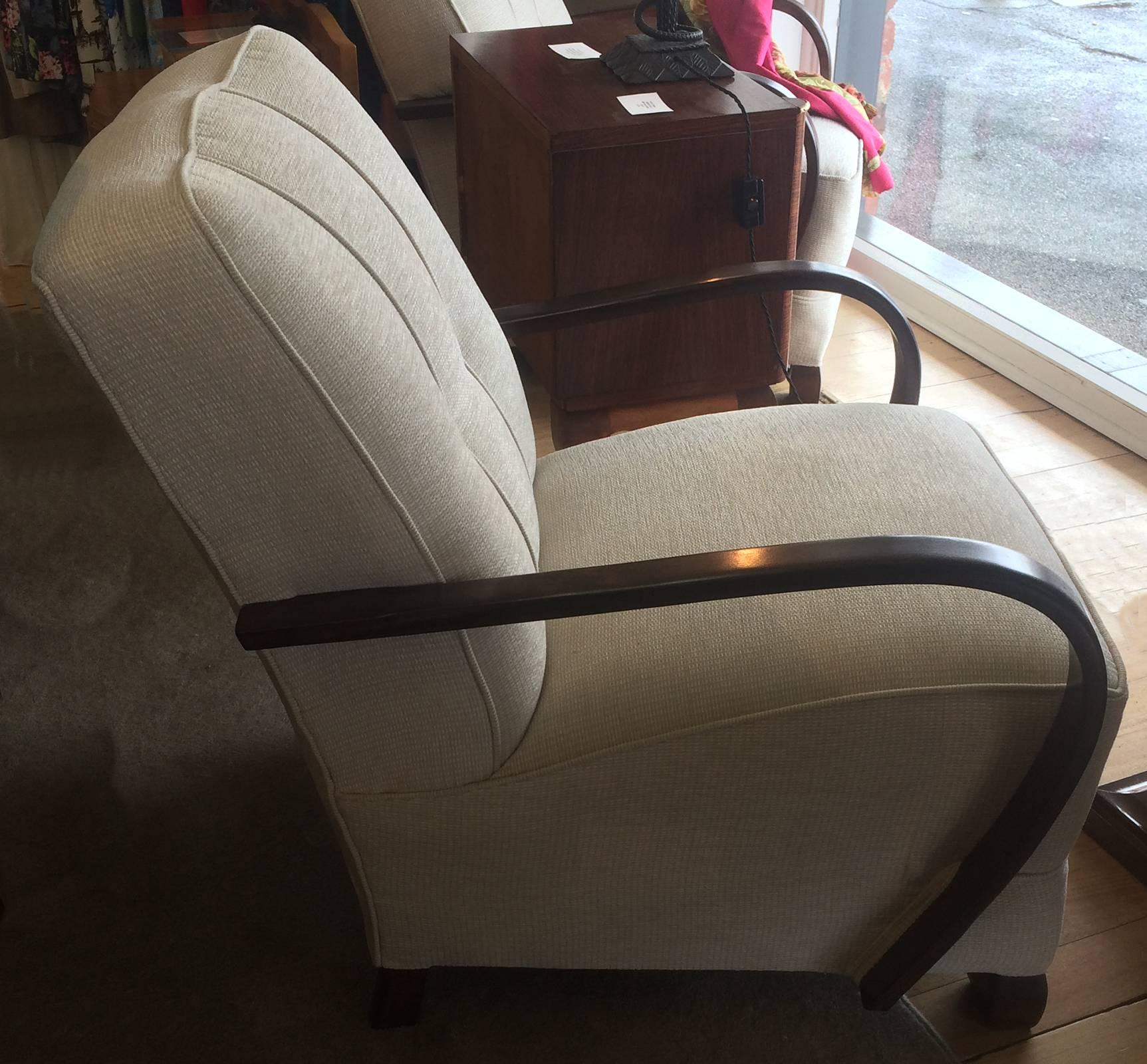 Art Deco pair of outstanding German Armchairs, with “see-through” bentwood arms and heavy vertical, Cubist front legs, square but outward curved rear legs. Amazingly comfortable deep cushioning, with excellent lower back support. The chairs are “as
