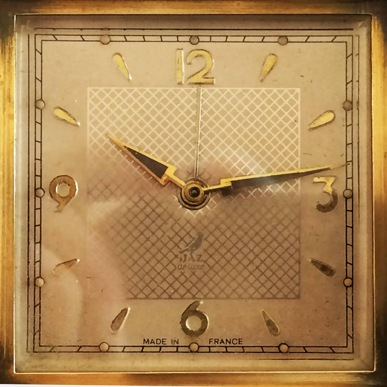 Art Deco, gilt clock on bronze, by 