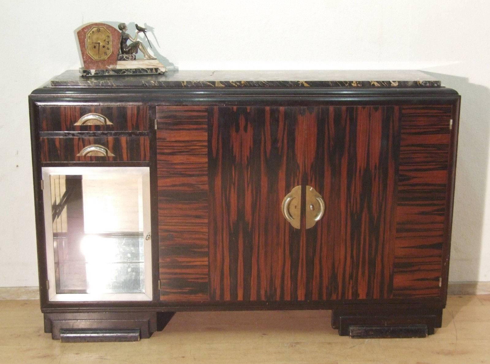 Art Deco sideboard with polished aluminium framed, mirrored cocktail cupboard in Macassar wood. Topped with the now rare, Italian “Potoro” marble in Black, with “gold” and white, veins. Multi-stepped timber at top and also, the 2 supporting feet.