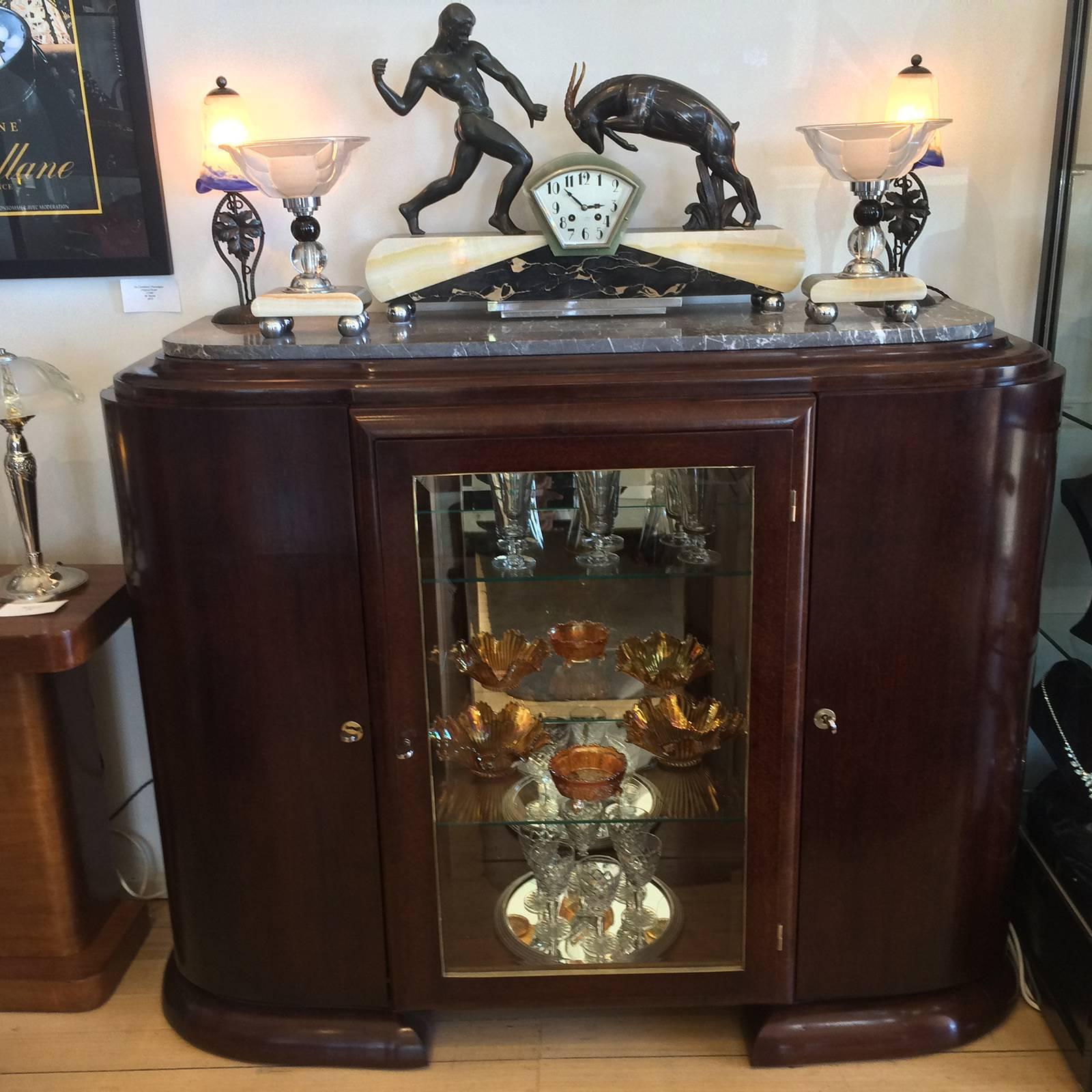 Art Deco French sideboard, grey marble with white vein top, mirrored back central display with two glass shelves and bevelled glass to reversed curved doors. Cabinet has stepped front, with quarter circle timber edges, also to the central door