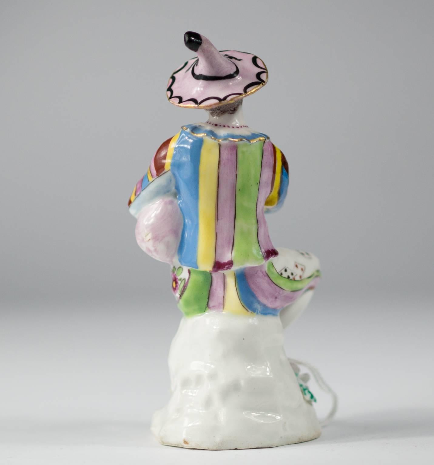 Rococo Bow Figure of Harlequin Playing Bagpipes, circa 1765 For Sale