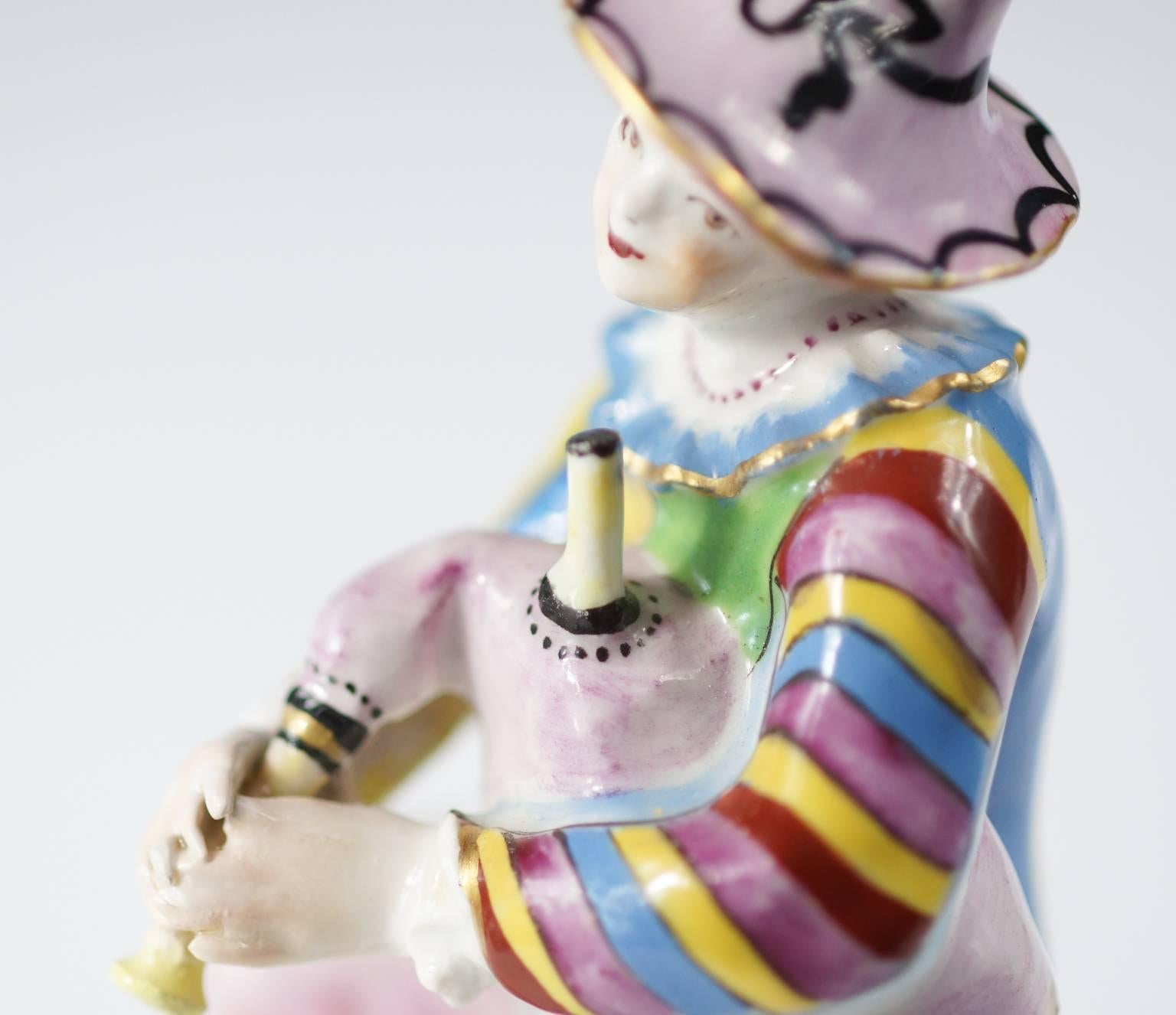 Mid-18th Century Bow Figure of Harlequin Playing Bagpipes, circa 1765 For Sale
