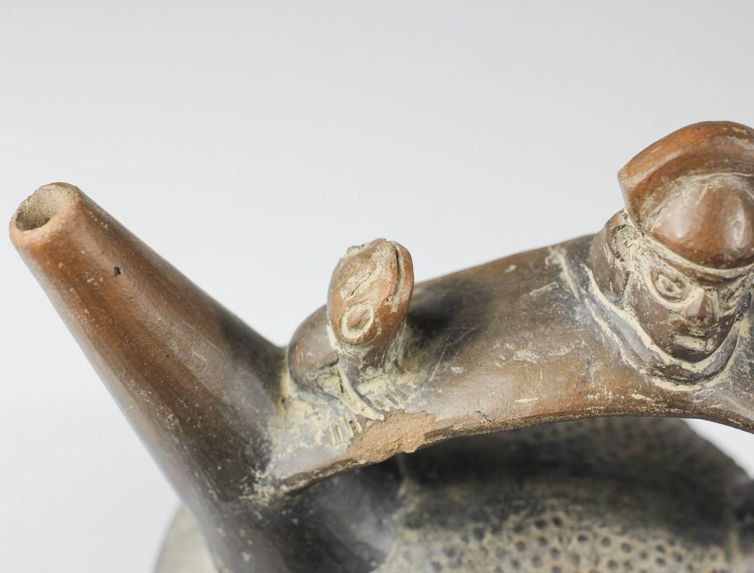 Chimu Blackware Stirrup Vessel, Warrior and Frogs, 12th Century 1