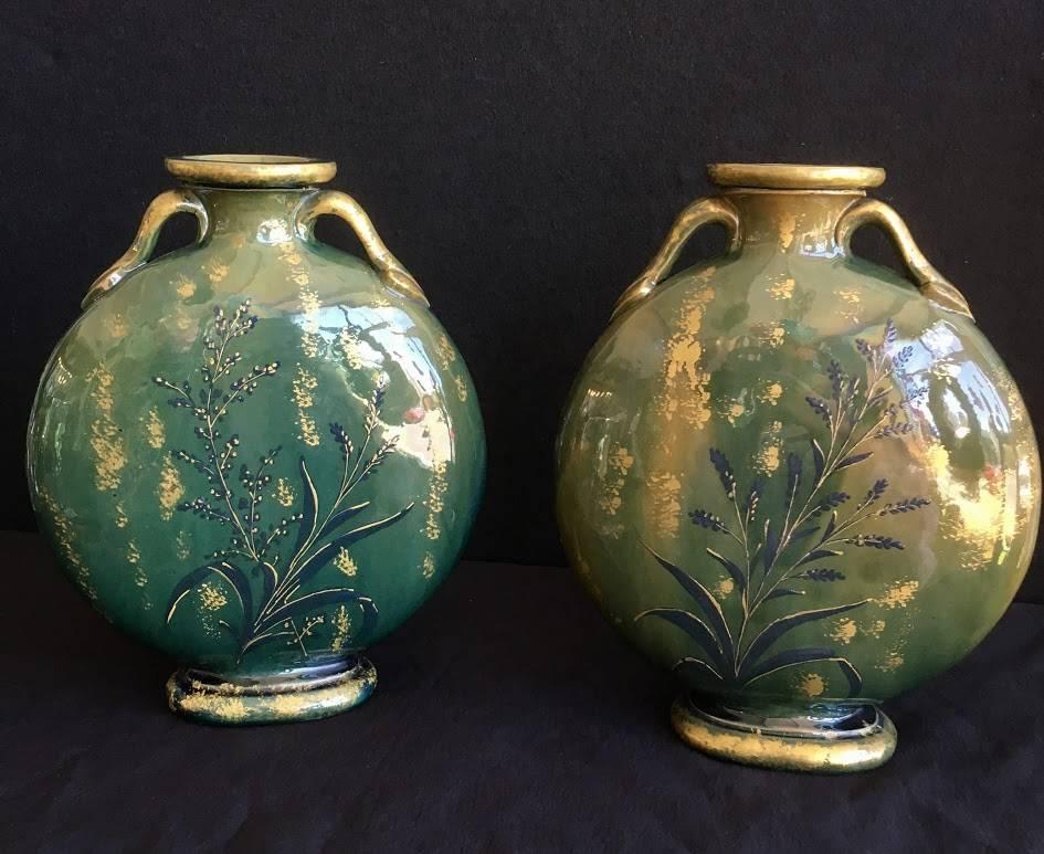 Pair of pottery Vallauris moon-flask vases decorated in the barboyine technique with flowers.