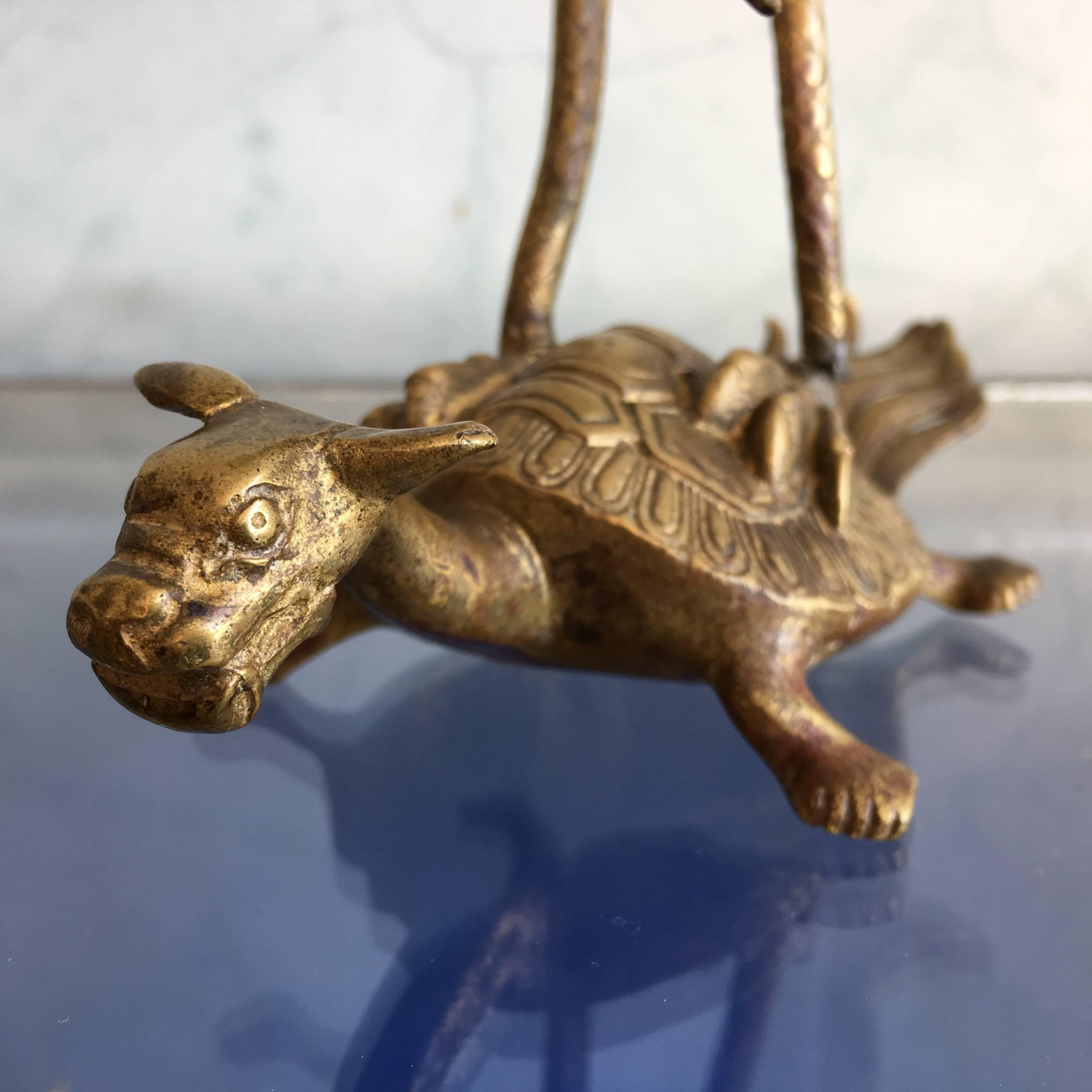 crane standing on turtle meaning
