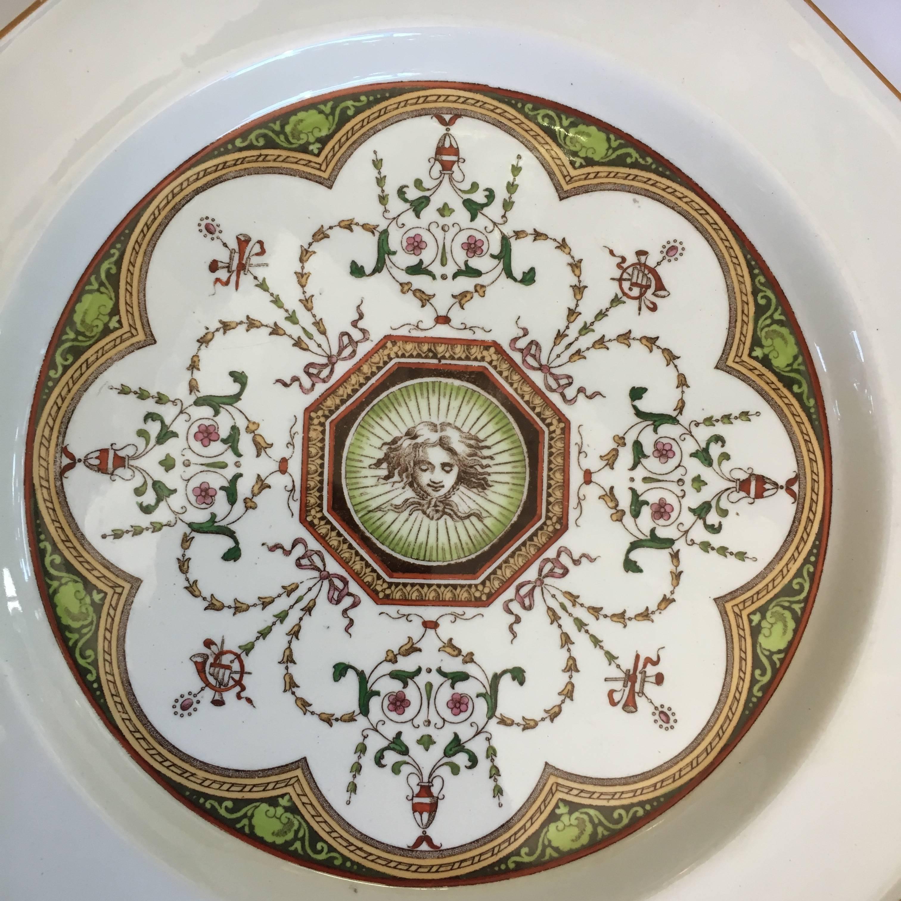 Minton octagonal plate with printed Aesthetic Movement design, named on reverse -Holland- Impressed year cypher for 1888, design registration mark (shape) for 1878.
 
