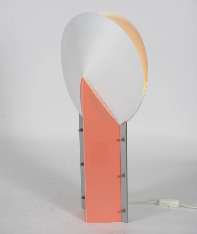 Set of 2 Reflex Lamps designed in the 1980s by Samuel Parker for Slamp.
Made of soft plastic with brass/metal details.
One is white with black and has brass details, the other is white with peach and has metal colored details.
