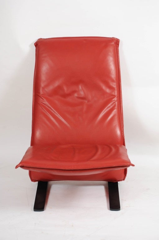 Concorde Easy Chair in a warm red leather designed by Pierre Paulin for Artifort. It has black feet.

We also have a matching Concorde Settee on stock.