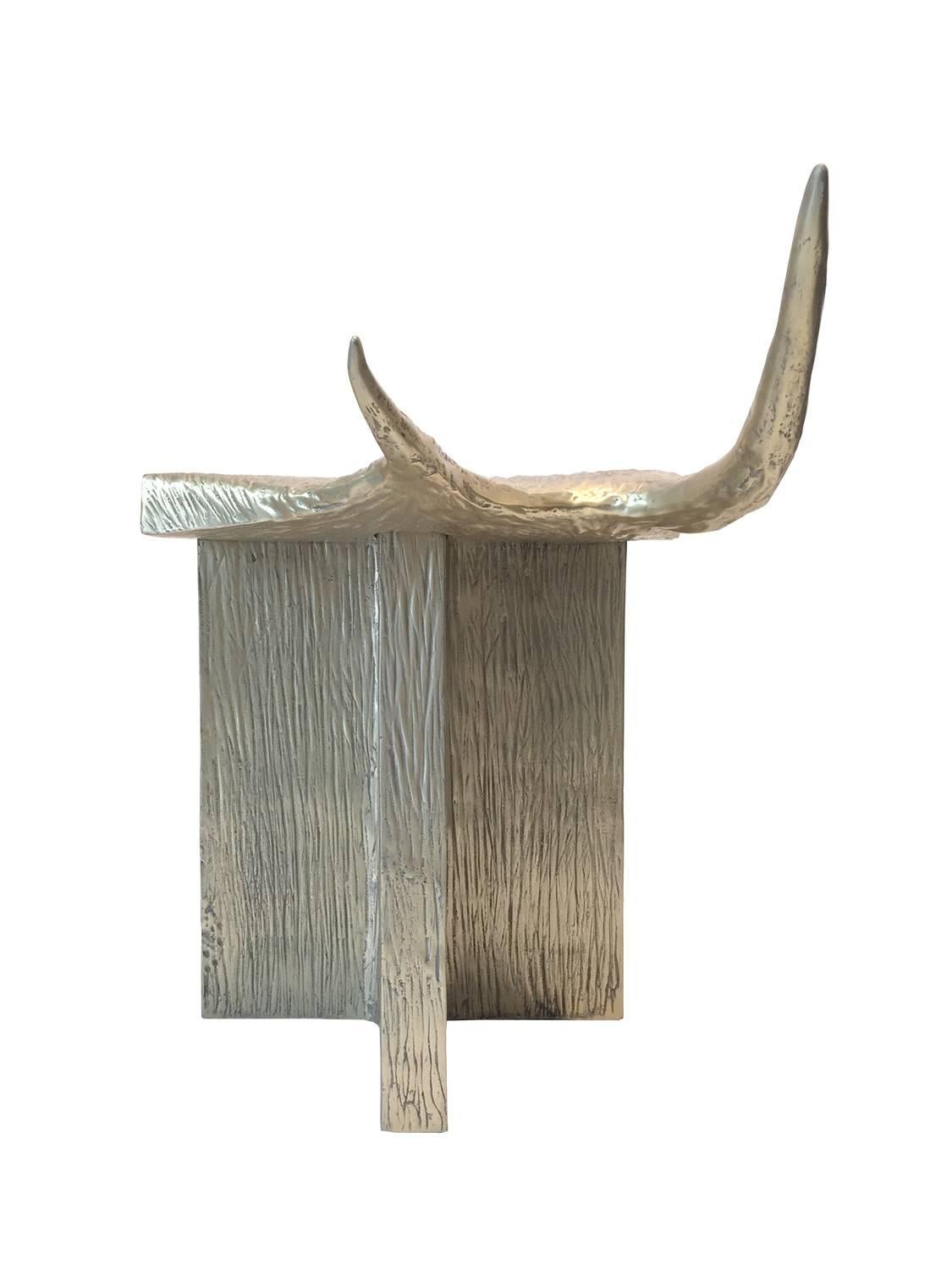 Aluminium Stag T Stool by Rick Owens available from LMD/studio.

An update on the Classic Stag T stool from Rick Owens Home collection, the aluminium Stag T stool features a simple 'T' shaped stool design with two protruding antler forms and a