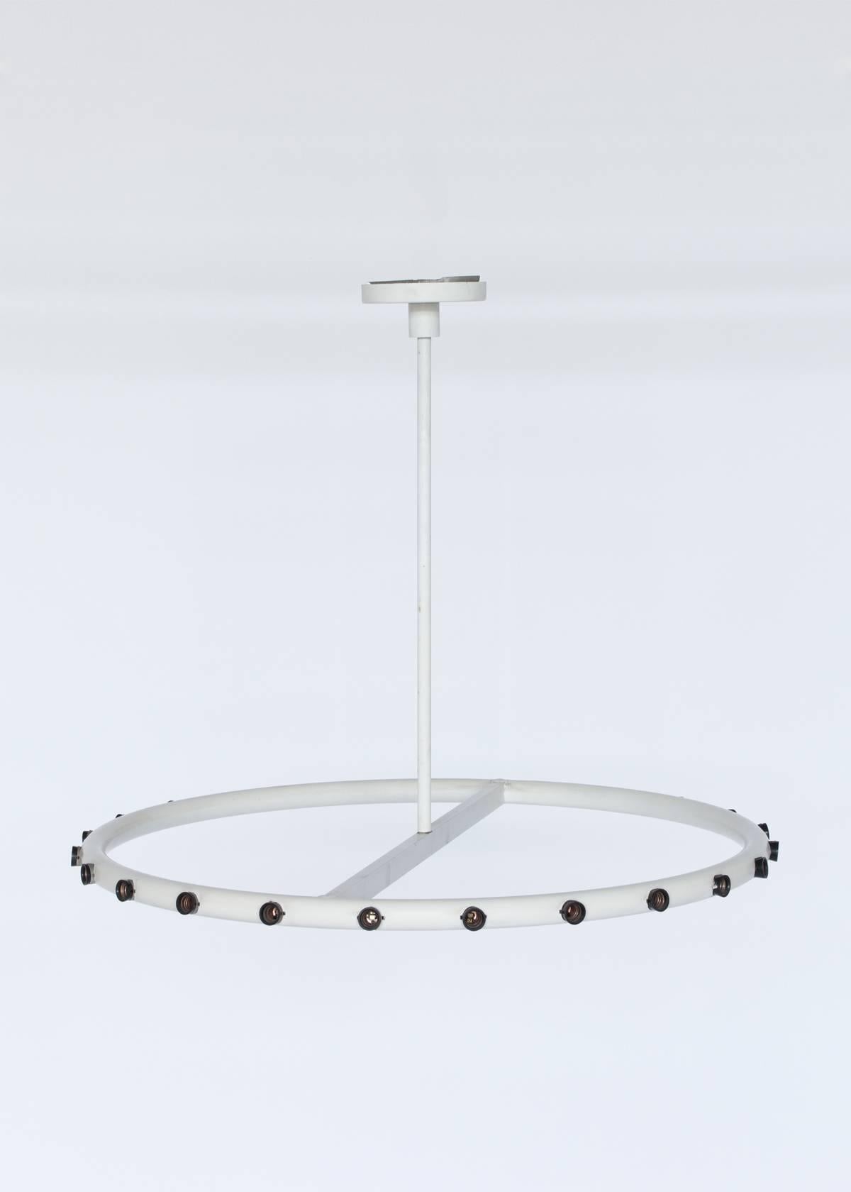 20th Century Twenty-Four-Bulb Hoop Ceiling Lamp/Chandelier by Alvin Lustig. This is the smaller of the two lamps, we also have an Extra Large vesion of this light.

Minimal and elegant twenty-four-bulb ceiling light by Alvin Lustig. This iconic