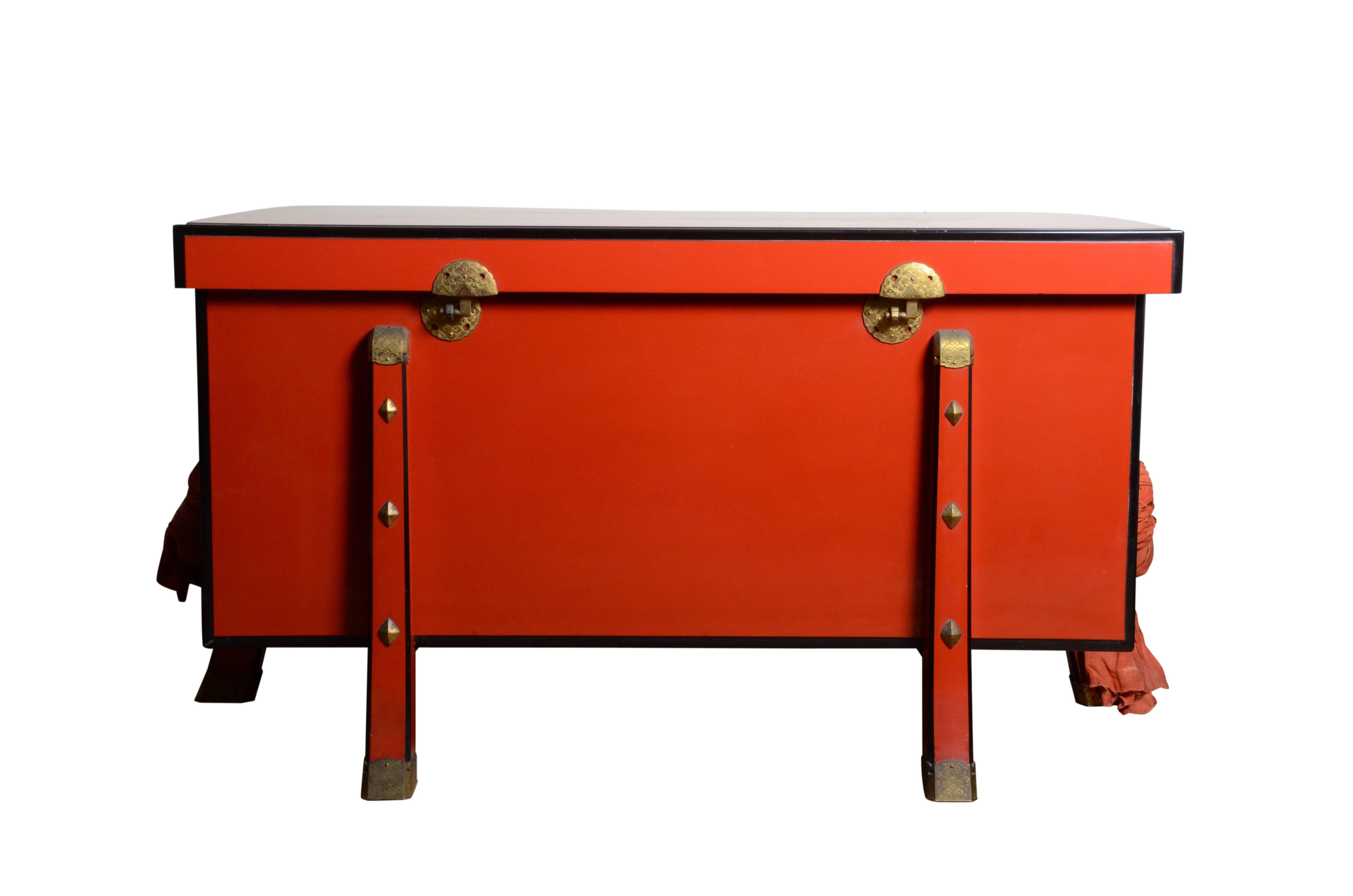 Rare Japanese vermilion red and black lacquered trunk, a copy of an example in the collection of the Shosoin Imperial treasure storehouse. Set on six splayed legs with elaborate chased and copper hardware. Meiji period, late 19th century.
