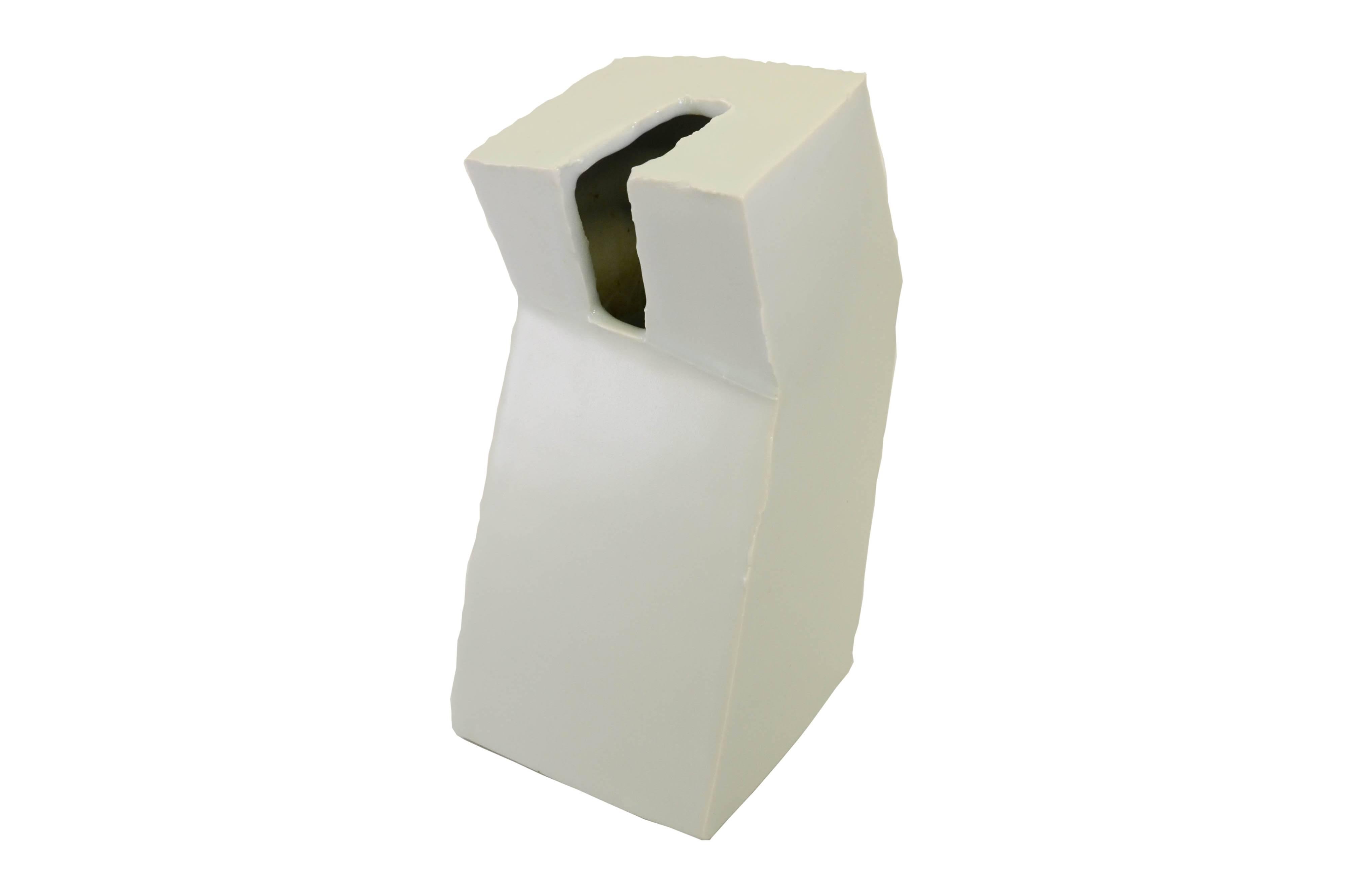 Contemporary Japanese Studio Pottery vase of sculptural angular form with a whitish toned glaze by Miyagawa Kiyoshi (b. 1943)

Dimensions: H 26cm x W 17cm x D13cm

Miyagawa Kiyoshi was born in Osaka and attended the Kyoto University of Art, Ceramics